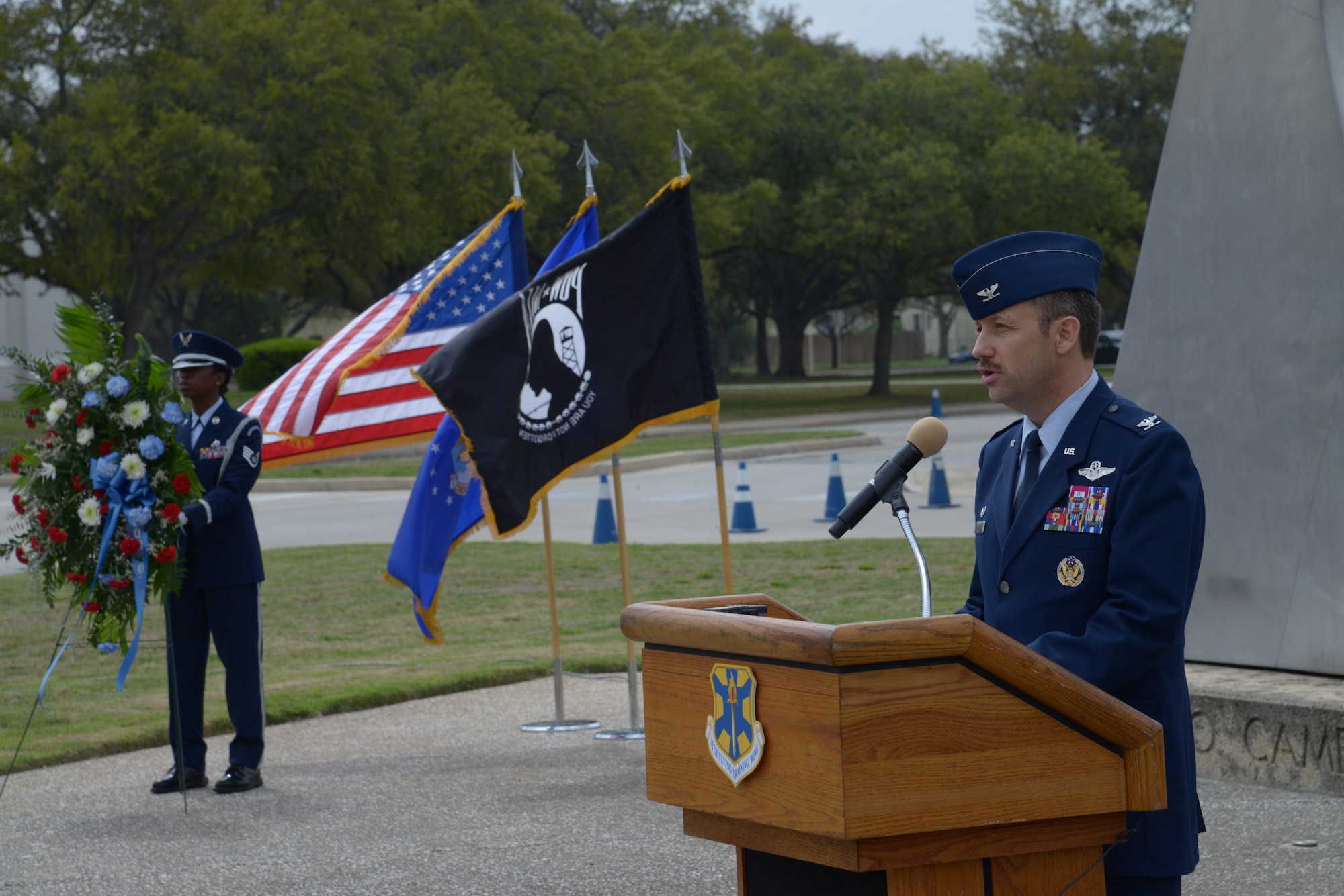 Col. Gerald Goodfellow, 12th Flying Training Wing commander, speaks during the 41st Freedom Flyer Reunion Wreath-laying Ceremony March 28 at Joint Base San Antonio-Randolph. Freedom Flyers are former Vietnam War prisoners of war and those involved in their repatriation, who return to JBSA-Randolph annually to share their stories and visit the site where they received their flying recertification, or their final flight, after their return from prisoner-of-war status. (U.S. Air Force photo by Joel Martinez)