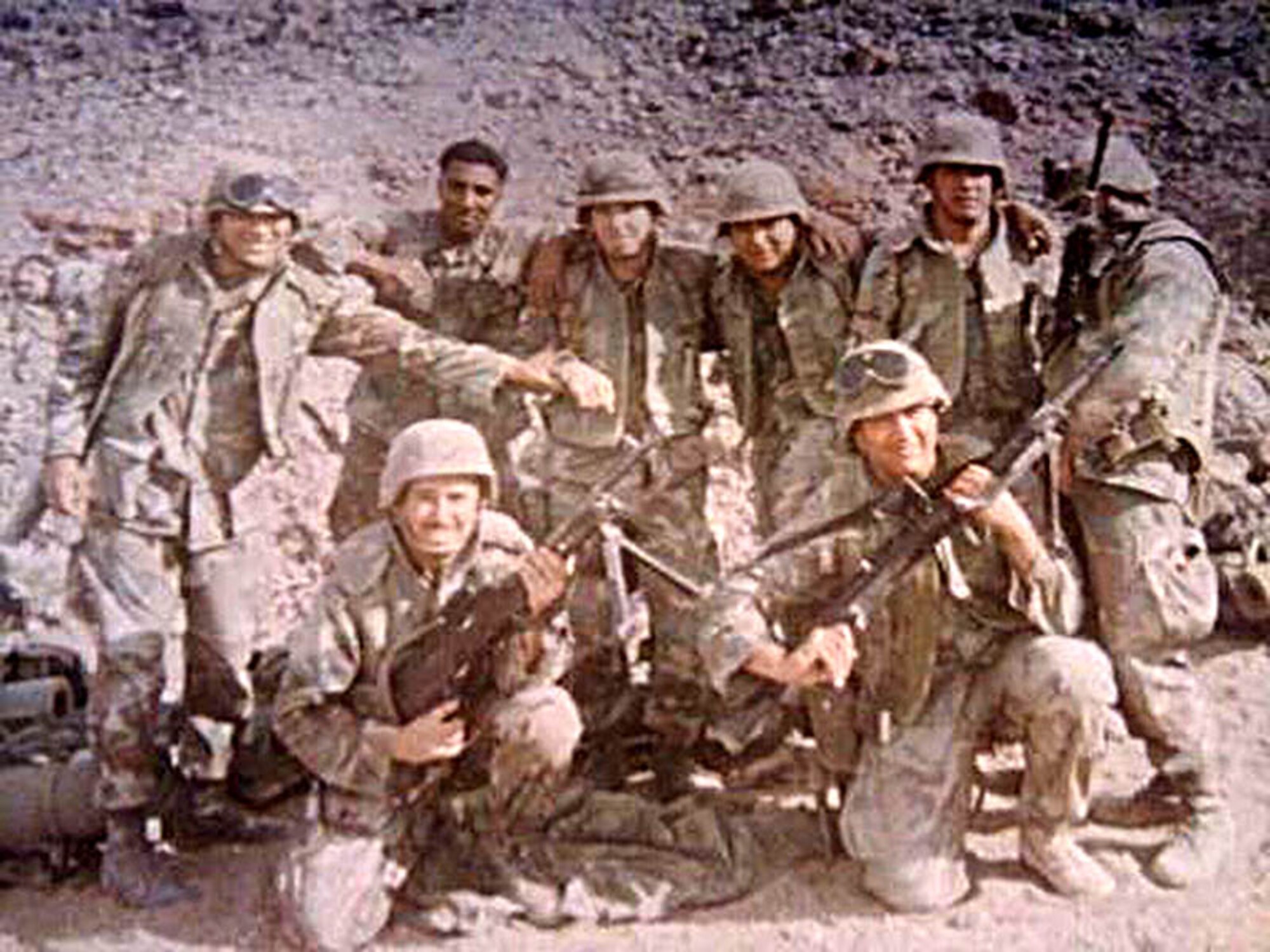 Capt. Colby Harrell, 97th Airlift Squadron pilot, (third from the right) started his military career in the infantry with the U.S. Marine Corps. (Courtesy photo)