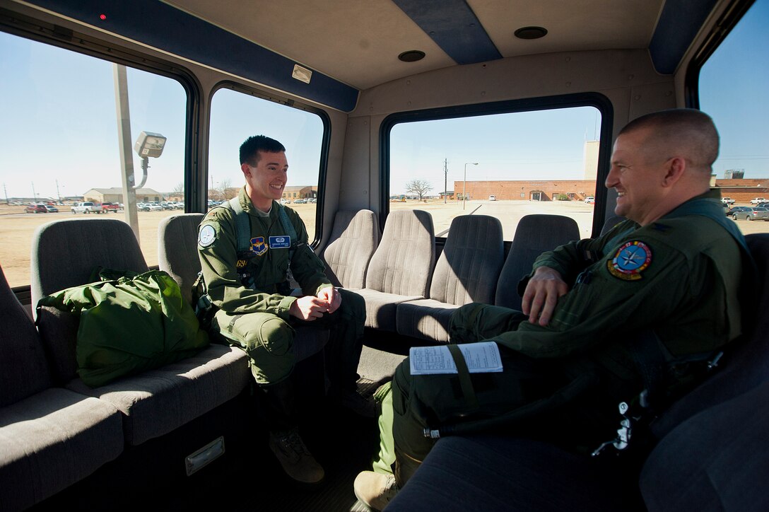2nd Lt. Abraham Morland, an 80th Flying Training Wing student, held dual citizenship in both the United States and the United Kingdom. Having opportunities to fly for both countries, he eventually chose to renounce his British citizenship and fly for the United States Air Force. Morland prepares to embark on his first flight, known as the dollar ride. (U.S. Air Force photos by Airman 1st Class Jelani Gibson)  