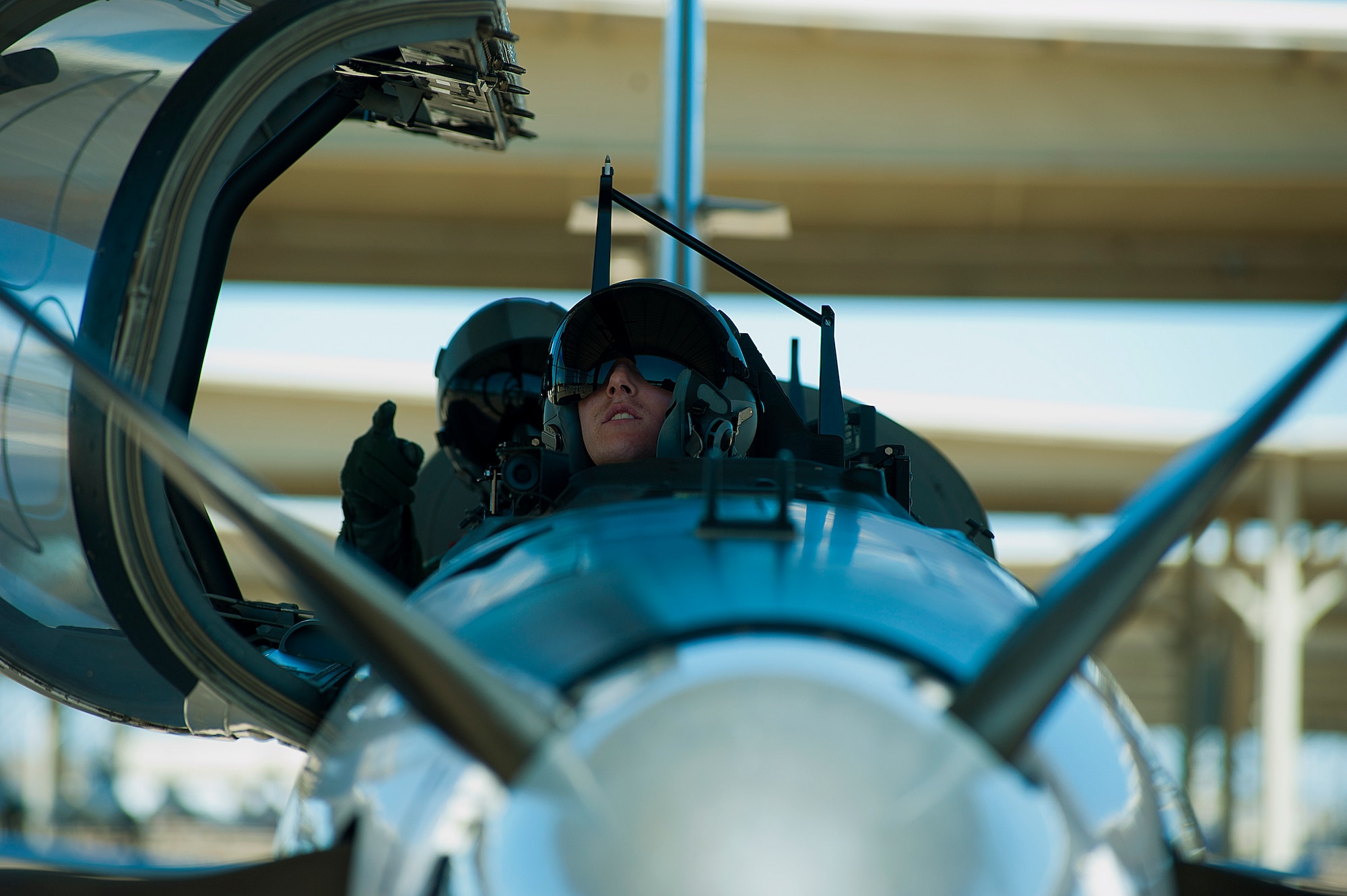 2nd Lt. Abraham Morland, an 80th Flying Training Wing student, held dual citizenship in both the United States and the United Kingdom. Having opportunities to fly for both countries, he eventually chose to renounce his British citizenship and fly for the United States Air Force. Morland prepares to embark on his first flight, known as the dollar ride. (U.S. Air Force photos by Airman 1st Class Jelani Gibson)  