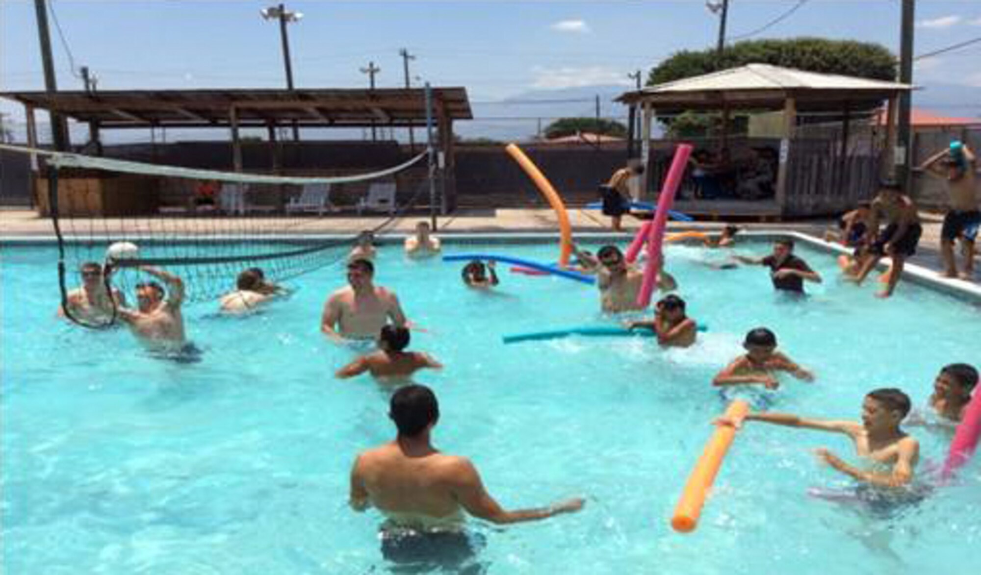 The San Antonio Padua Boys Home enjoyed a day at Soto Cano Air Base, Honduras with the Winged Warriors of the 1-228th Aviation Regiment.  The boys visited the base fire station and learned how to put on the fire protective gear, watched a kids movie and swam at the base pool.  (Courtesy Photo)