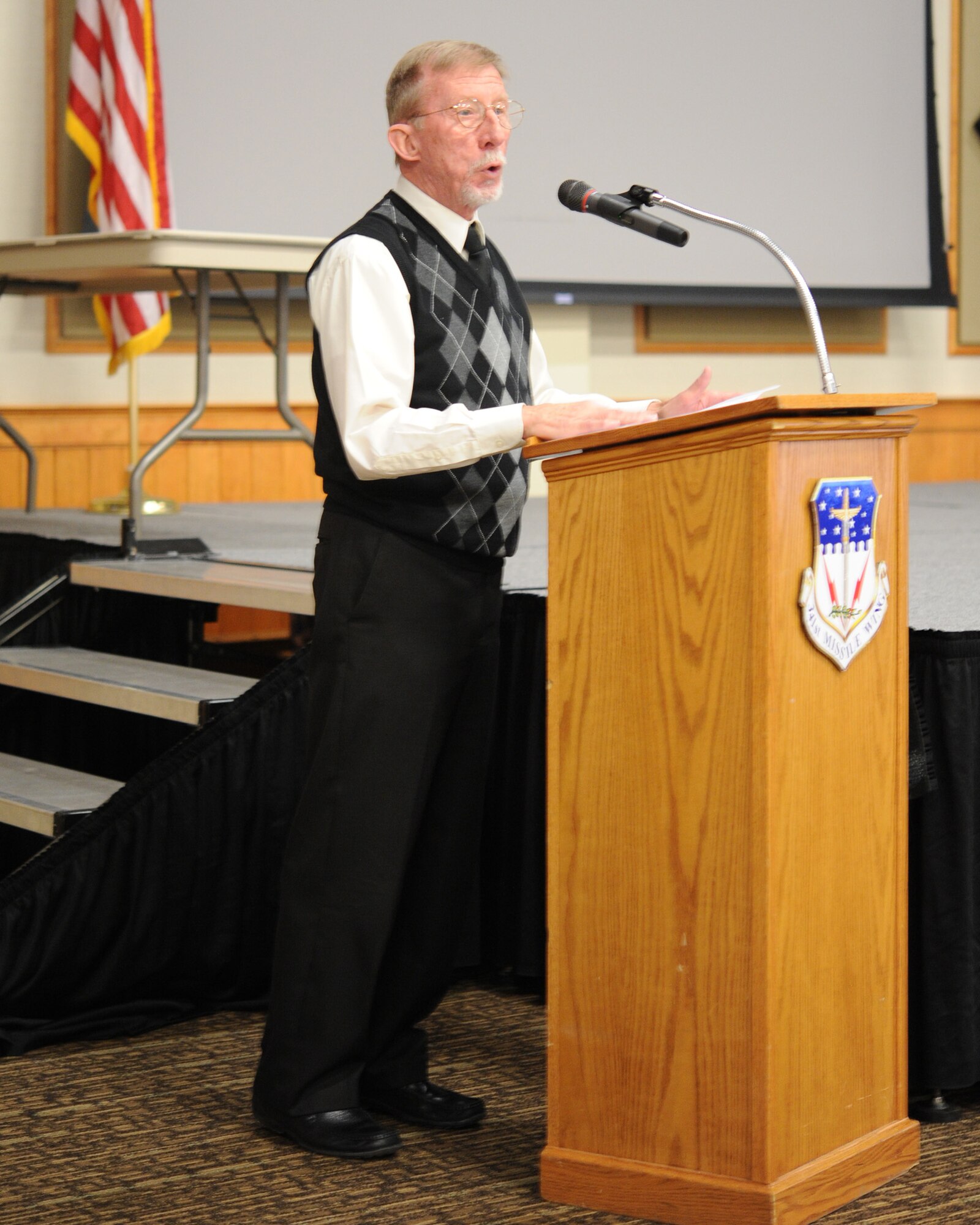 John Foley, Malmstrom Airman and Family Readiness Center director, speaks at the Grizzly Bend on March 24. Foley was speaking on behalf of the Air Force Aid Society – one of the four charities affiliated with AFAF.  Because of the money raised during AFAF, the AFAS was able to help more than 100 Airmen at Malmstrom receive emergency aid in 2013. (U.S. Air Force photo/Airman 1st Class Joshua Smoot)