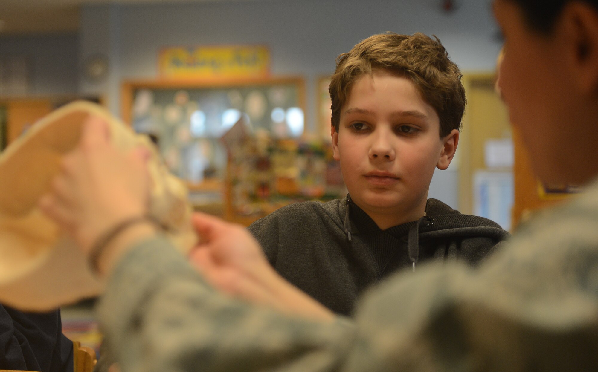 A Lakenheath Intermediate School student participates in a hands-on activity during the 8th bi-annual Science, Technology, Engineering, and Mathematics Day at Royal Air Force Lakenheath, England, March 25, 2014. During STEM day, students rotated through a variety of hands-on activities including a digital star lab, puff mobiles, bridge construction, astronomy maps, and teeth and scientific inquiries led by subject matter experts. “Our school participates in different activities throughout the year to immerse 4th and 5th graders into STEM,” said Randi Dalton, STEM coordinator. “Those activities include STEM workshops, contests, clubs, and military and British guest speakers.” (U.S. Air Force photo by Airman 1st Class Trevor T. McBride/Released)