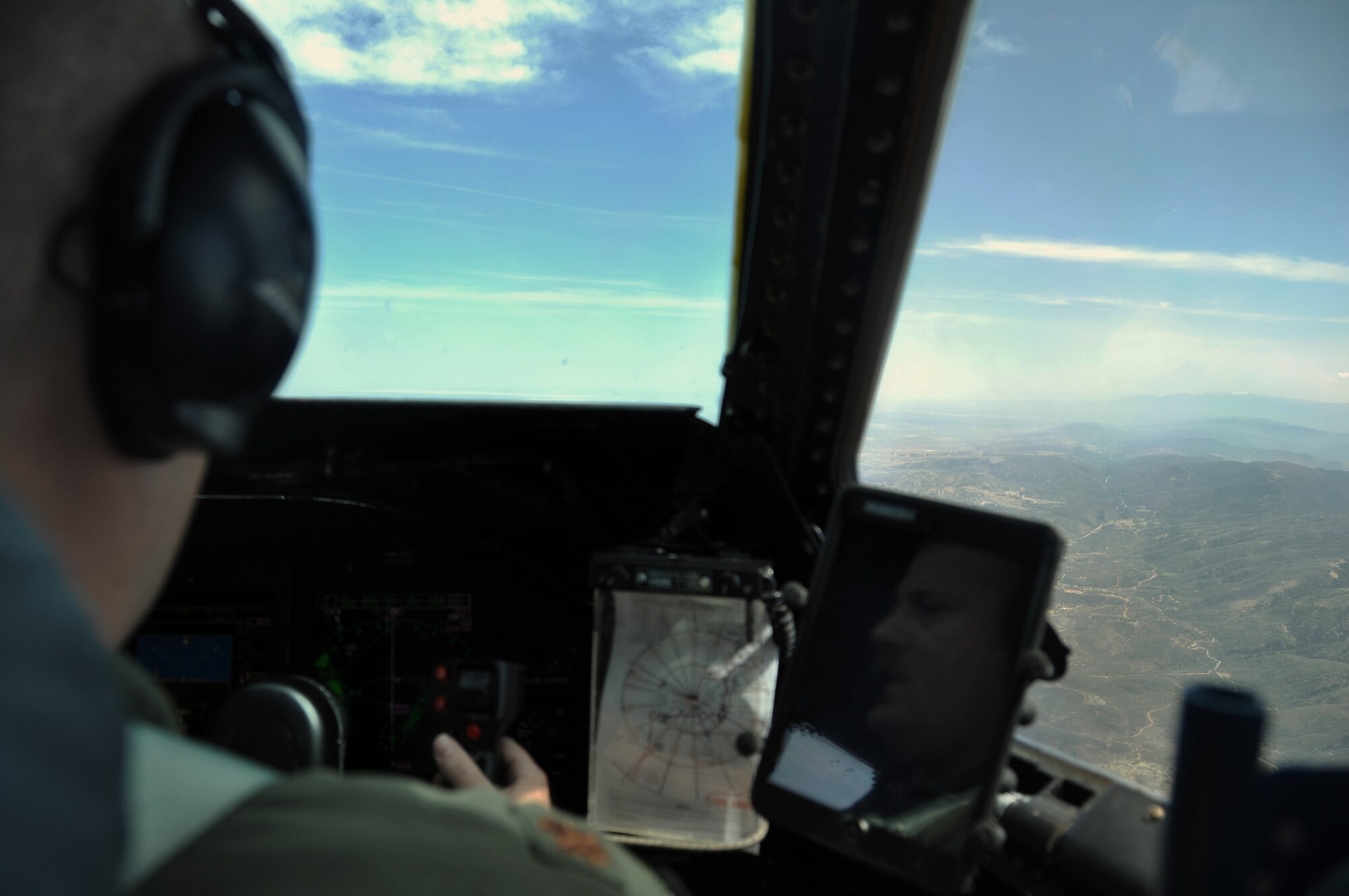 Maj. Jason Roberts, 60th Operations Support Squadron and ACOT airborne mission commander, completes low-level tactical maneuvering in a C-5 Galaxy March 25 as part of the training. (U.S. Air Force photo/Senior Airman Madelyn Brown)
