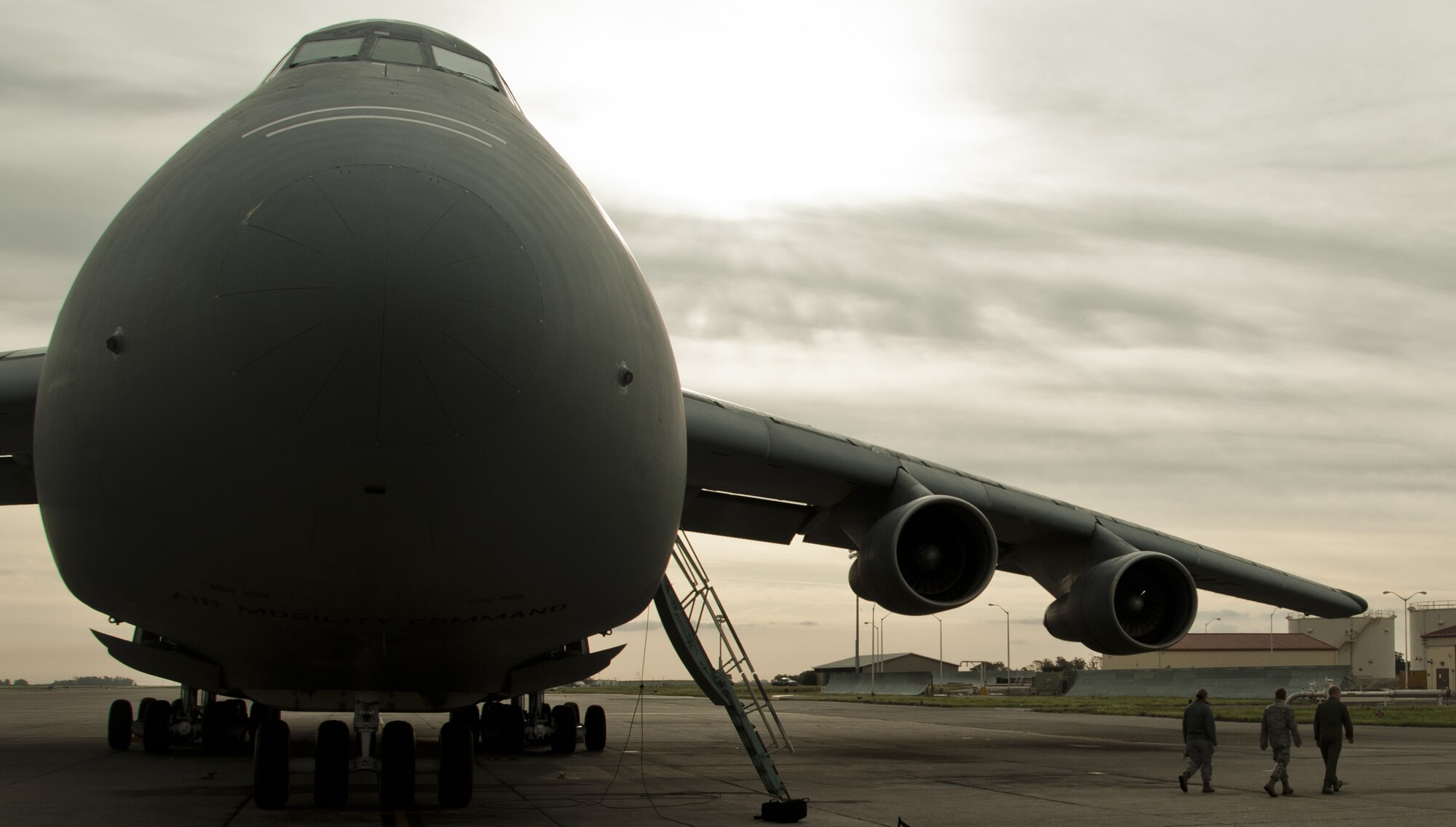 A C-5 Galaxy undergoes preflight inspections March 25 on the Travis flightline prior to flying down the California coast in support of the advanced combat operations training along with 25 other aircraft from the Navy and Air Force. (U.S. Air Force photo/Senior Airman Madelyn Brown)