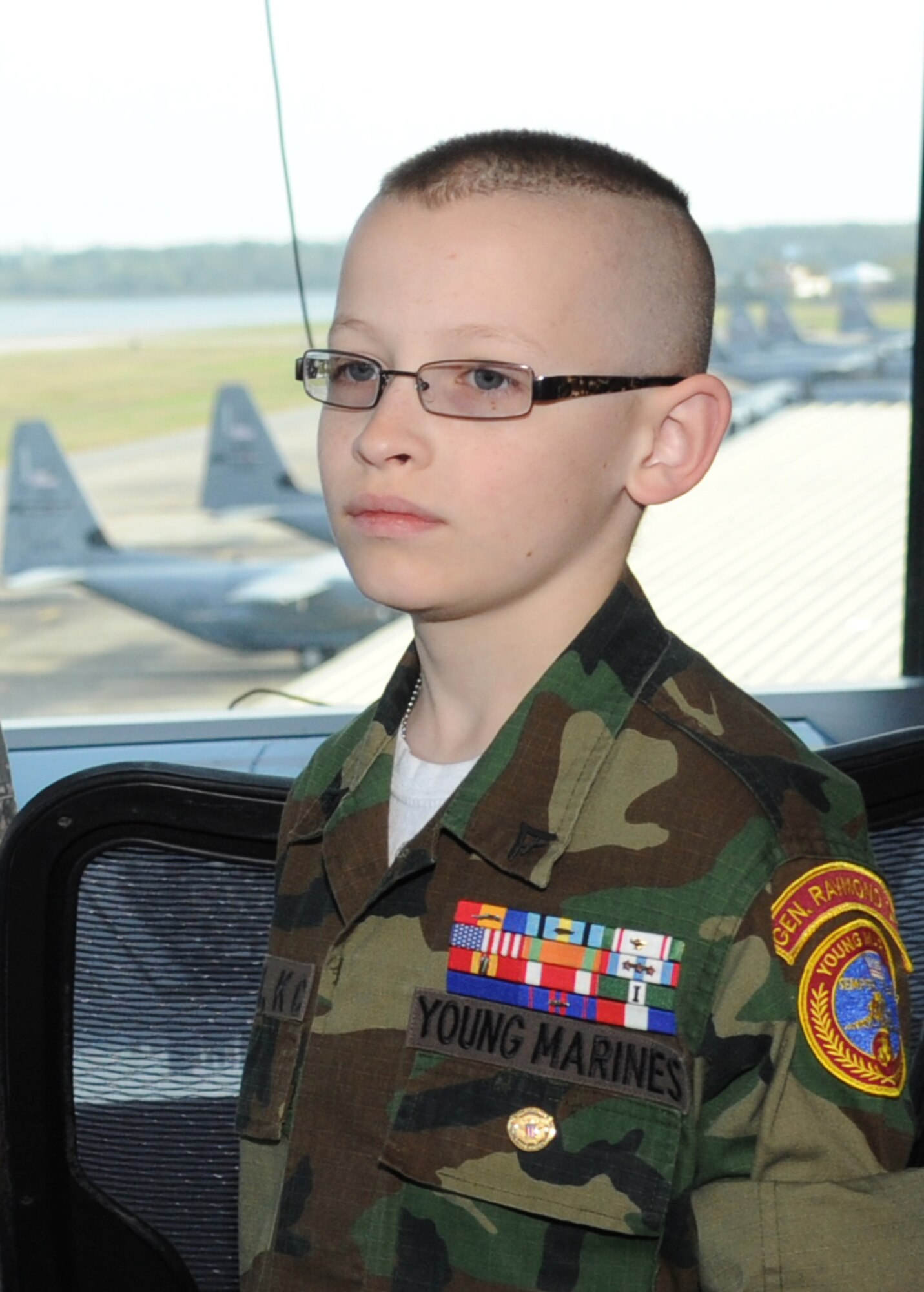 Eleven-year-old Cody Jackson receives a tour of the air traffic control tower March 27, 2014, Keesler Air Force Base, Miss.  Jackson, from Alpharetta, Ga., is known as "One Boy USO" for his personal mission to thank as many military members as he can, either by shaking hands, welcoming them home or sending packages to deployed troops.  He was accompanied by his parents and staff members from the local chapter of the American Red Cross. (U.S. Air Force photo by Kemberly Groue)