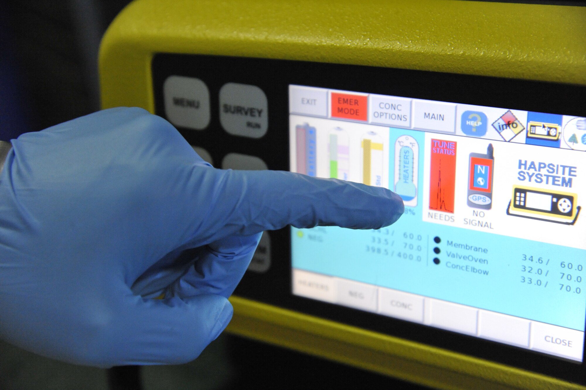 Staff Sgt. Staff Sgt. Tyler Haugland, 509th Medical Operations Squadron bioenvironmental readiness and radiation program manager, operates a HAPSITE at Whiteman Air Force Base, Mo., March 18, 2014. The HAPSITE is used to quantify and identify unknowns. (U.S. Air Force photo by Airman 1st Class Keenan Berry/Released)