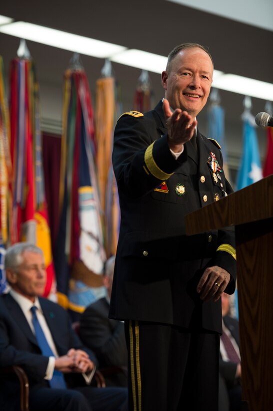 Army Gen. Keith Alexander, who is stepping down as head of U.S. Cyber Command and the National Security Agency, delivers remarks at his retirement ceremony at the National Security Agency headquarters on Fort George Meade, Md., March 28, 2014.