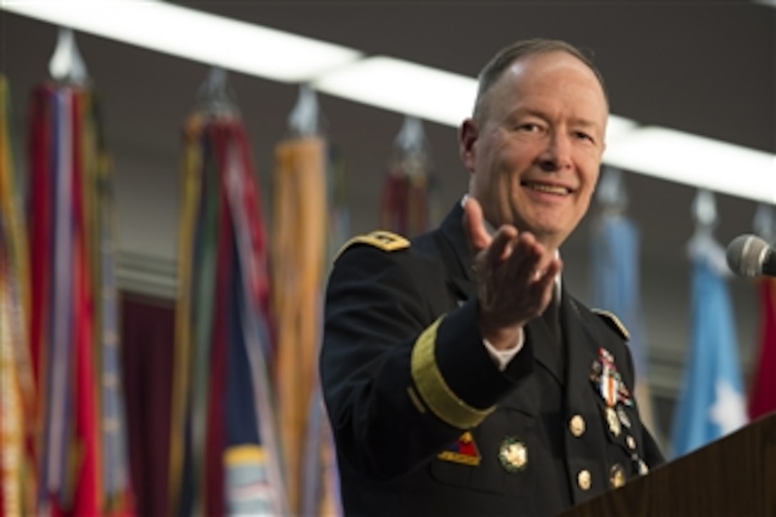 Army Gen. Keith Alexander, who is stepping down as head of U.S. Cyber Command and the National Security Agency, delivers remarks at his retirement ceremony at the National Security Agency headquarters on Fort George Meade, Md., March 28, 2014.