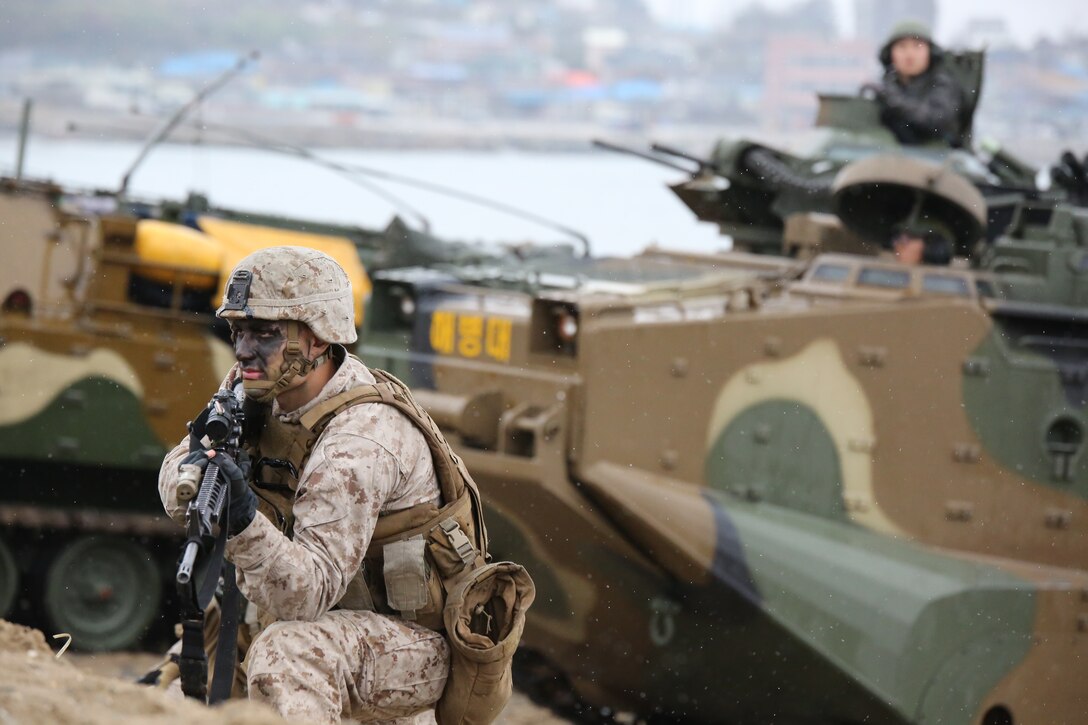 U.S. Marine from Randolph, N.J. works with ROK Marines during Ssang