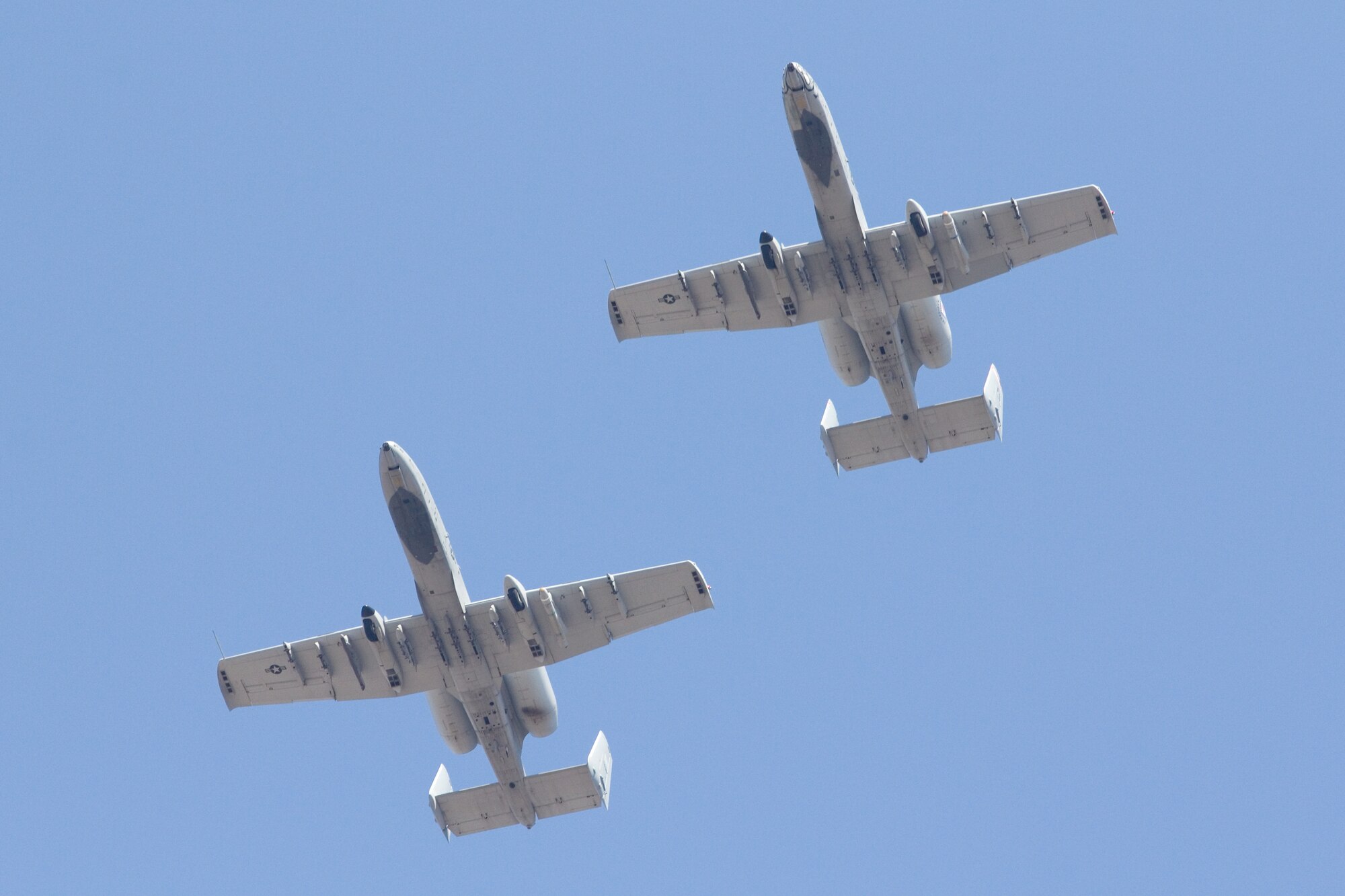 Lt. Col. Marty Dahlem (Tail No. 638) and Maj. Doug Davis (Tail No. 188), pilots with the 188th Fighter Wing, train at the 188th’s Detachment 1 Razorback Range March 25, 2014, during their fini flights in the A-10C Thunderbolt II “Warthog.” Dahlem is the 188th Operations Support Squadron commander and Davis is the 188th Detachment 1 commander. (Courtesy photo by Nick Thomas)