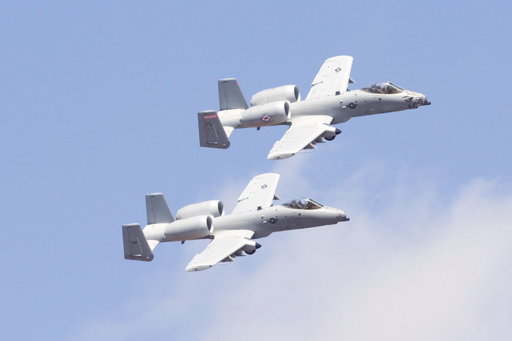Lt. Col. Marty Dahlem (Tail No. 638) and Maj. Doug Davis (Tail No. 188), pilots with the 188th Fighter Wing, train at the 188th’s Detachment 1 Razorback Range March 25, 2014, during their fini flights in the A-10C Thunderbolt II “Warthog.” Dahlem is the 188th Operations Support Squadron commander and Davis is the 188th Detachment 1 commander. (Courtesy photo by Nick Thomas)
