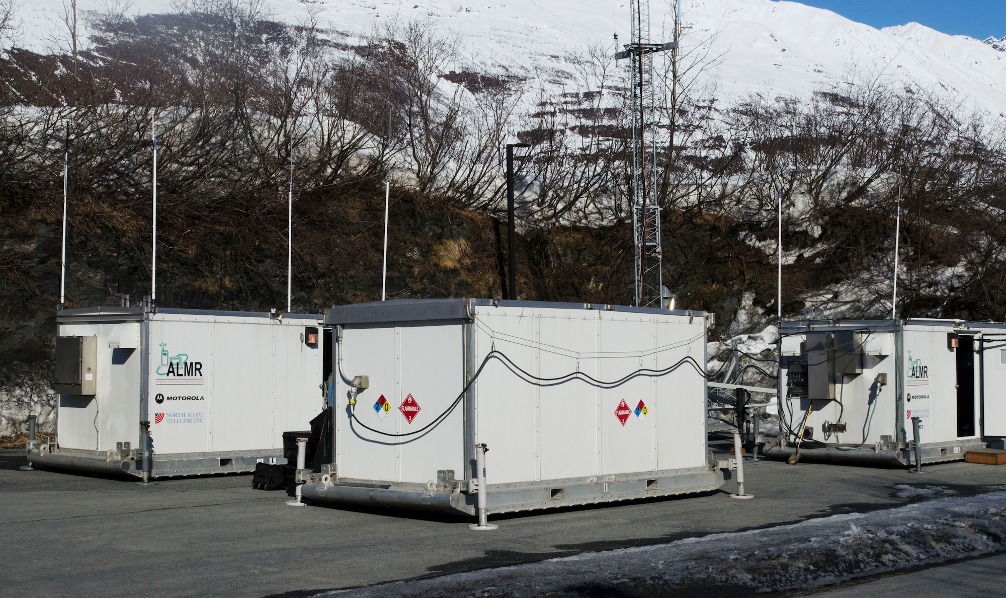 The Alaska Land Mobile Radio Transportable system is set up by North Slope Telecom Inc. and Bering Straits Information Technology personnel, in direct response to a communication black out during Alaska Shield 14 here, March 28, 2014. Alaska Shield 14 is an exercise that involves state, federal, military, and local agencies, designed to test the response and coordination of the a disaster modeled after the 1964 earthquake and subsequent tsunami that devastated much of South Central Alaska including the city of Valdez. (U.S. Army photo by Spc. True Thao)