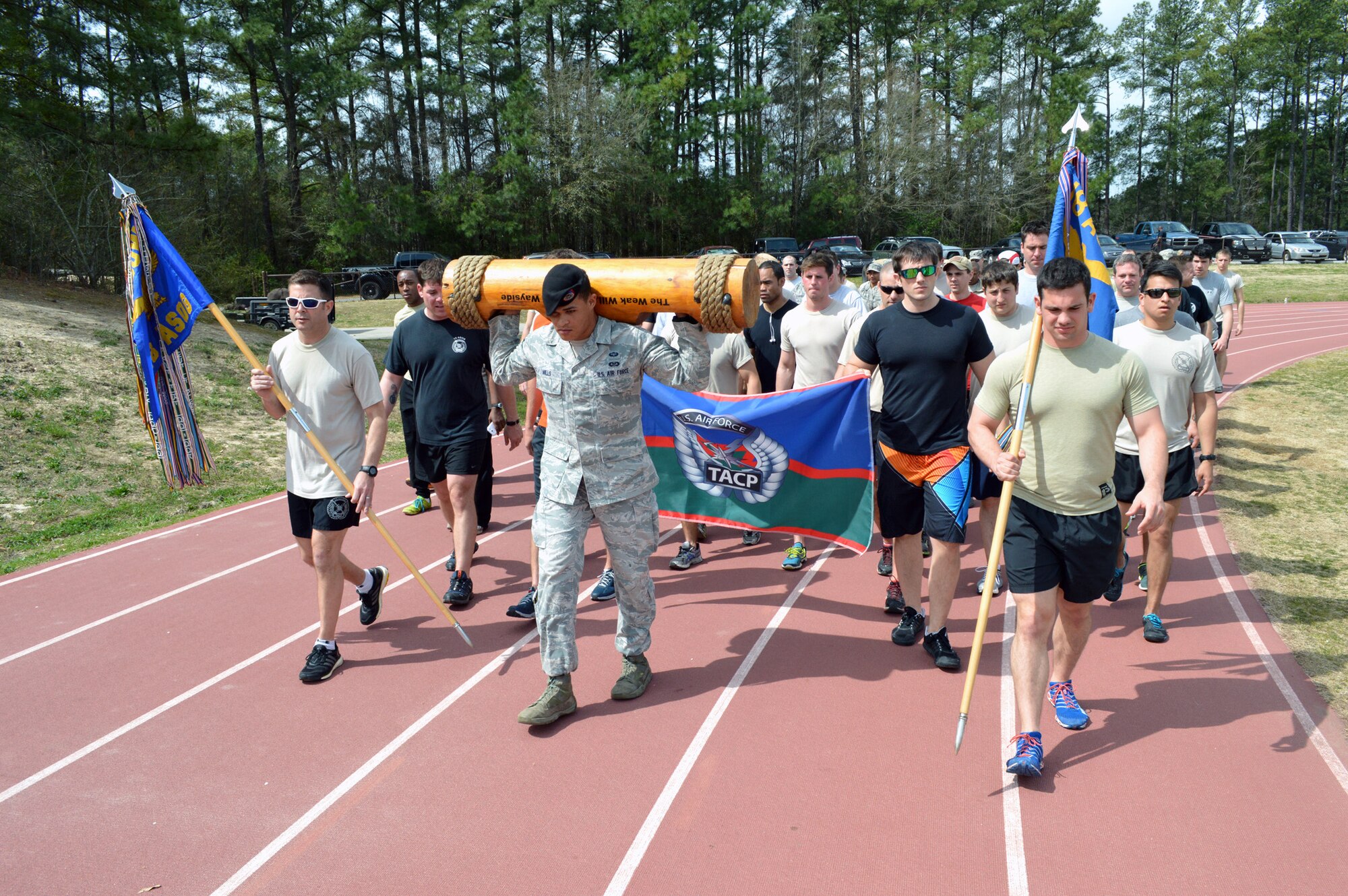 Tactical Air Control Party airmen assigned to Pope Army Airfield, Fort Bragg, N.C., walk the final lap at the Hedrick Stadium track during the third annual worldwide TACP 24-hour Run Challenge fundraising event on March 28. The event is held to honor and raise funds for fallen TACP brothers in arms and their families. TACP airmen from the 18th Air Support Operations Group, 14th Air Support Operations Squadron, 682nd Air Support Operations Squadron and the 18th Weather Squadron accumulated over 2,500 miles during this year’s event at Pope. (U.S. Air Force photo/Marvin Krause)