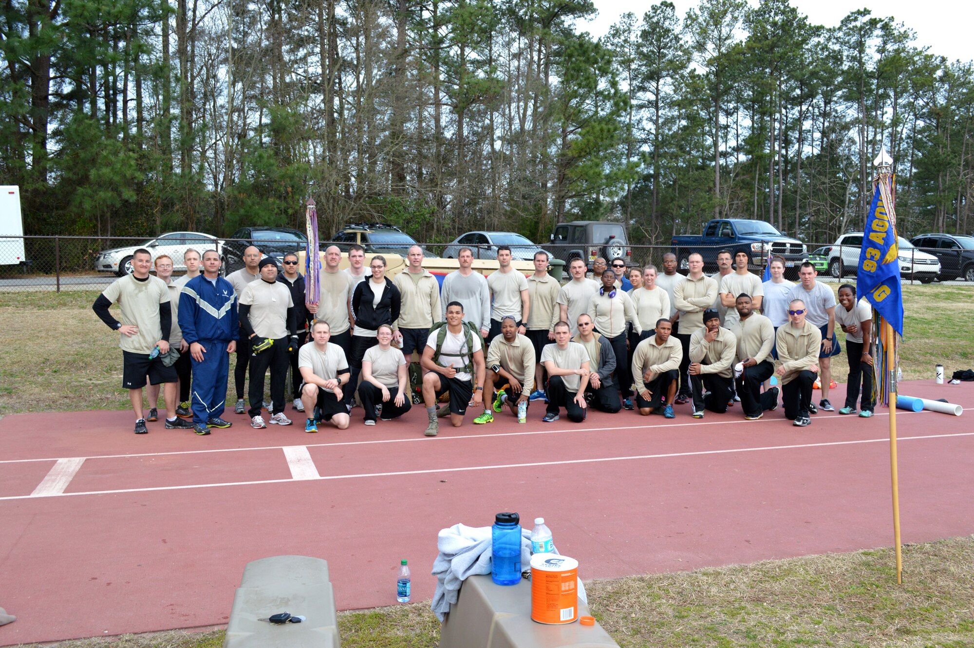 Tactical Air Control Party Airmen assigned to Pope Army Airfield, Fort Bragg, N.C. pose for a group photo during the third annual worldwide TACP 24-hour Run Challenge fundraising event on March 28 held at the Hedrick Stadium track. The event is held to honor and raise funds for fallen TACP brothers in arms and their families. TACP airmen from the 18th Air Support Operations Group, 14th Air Support Operations Squadron, 682nd Air Support Operations Squadron and the 18th Weather Squadron accumulated over 2,500 miles during this year’s event at Pope. (U.S. Air Force photo/Marvin Krause)