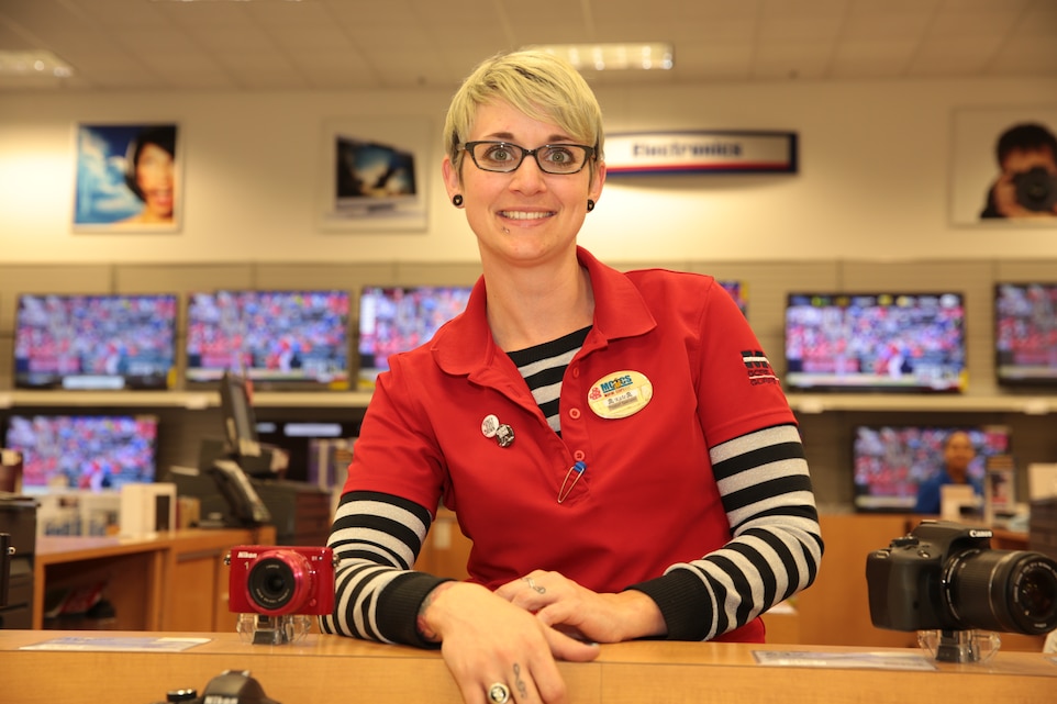 Katie Walker, known as the face of electronics at the Combat Center Exchange, is known for her free spirit personality and love of electronics.
