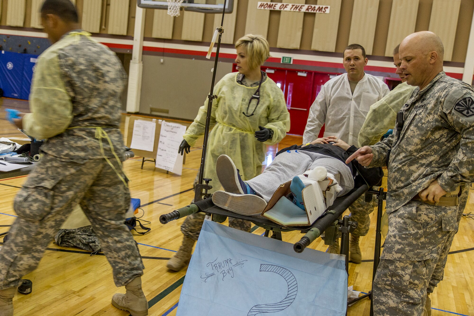 Capt. Lynn L. Maupin with the Arizona Army National Guard 996 Area Support Medical Company out of Tempe Ariz. works at the alternate care site during exercise Alaska Shield 14 here, March 29, 2014. The team of medical specialist work together to treat and care for role playing civilian patients that could not be treated at the local hospital. Alaska Shield 14 is an exercise that involves state, federal, military, and local agencies, designed to test the response and coordination of the disaster modeled after the 1964 earthquake and subsequent tsunami that devastated much of South Central Alaska including the city of Valdez. (U.S. Army photo by Sgt. Benjamin John)