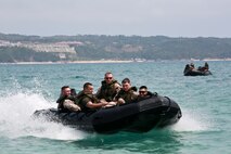 Marines maneuver Combat Rubber Raiding Craft March 19 during water-mobility training in the ocean off the Camp Schwab Beach. The CRRC are often used as safety vehicles for Bridge Erection Boats during the employment of Improved Ribbon Bridges. The Marines are combat engineers with Company A, 9th Engineer Support Battalion, 3rd Marine Logistics Group.