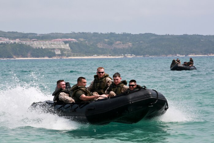 Marines maneuver Combat Rubber Raiding Craft March 19 during water-mobility training in the ocean off the Camp Schwab Beach. The CRRC are often used as safety vehicles for Bridge Erection Boats during the employment of Improved Ribbon Bridges. The Marines are combat engineers with Company A, 9th Engineer Support Battalion, 3rd Marine Logistics Group.