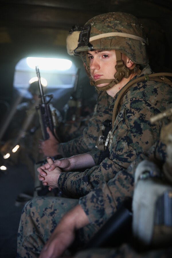 Lance Corporal Michael Carroll, mortarman, Weapons Company, 3rd Battalion, 8th Marines, assigned to Black Sea Rotational Force, waits as he is transported by a 7-ton truck to an embarkation point during a contingency response drill. Contingency response drills are designed to train Marines to be ready at a moment’s notice.  Black Sea Rotational Force 14 is a task force of Marines and sailors with the mission to sustain positive relationships with partner nations uphold regional stability and increase military operational capabilities while also proving the ability for rapid crisis response in the Black Sea, Balkan and Caucasus regions of Eastern Europe. (Official Marine Corps photo by Staff Sgt. Tanner M. Iskra, 2nd Marine Division Combat Camera, Black Sea Rotational Force/Released)