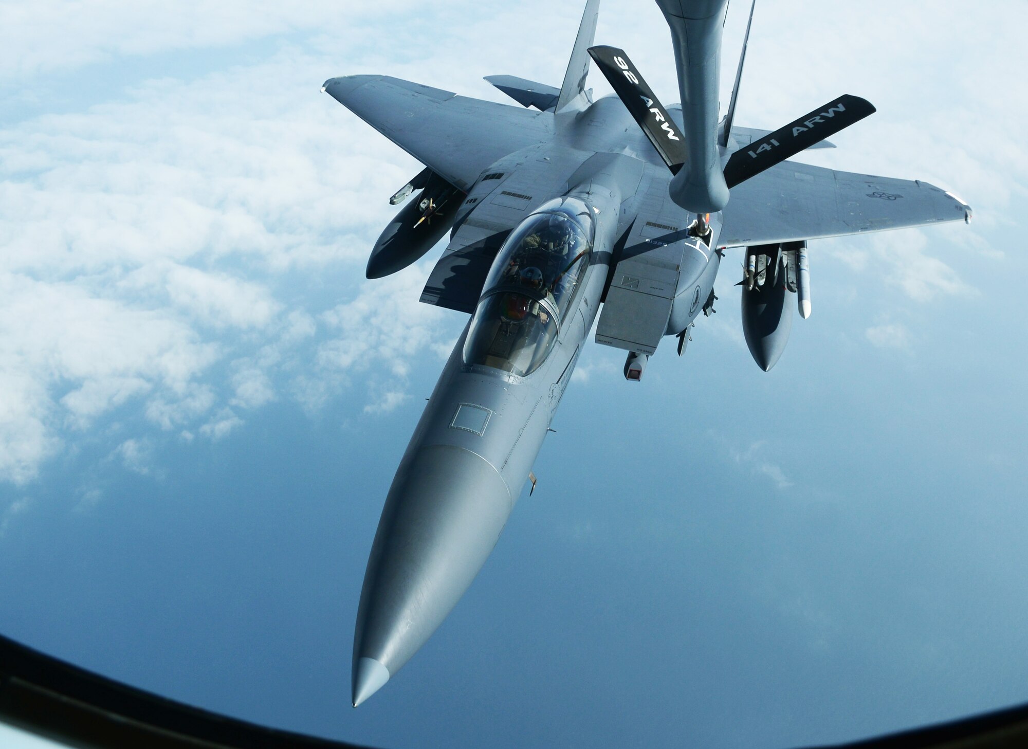 An F-15E Strike Eagle from RAF Lakenheath, England, takes on fuel from a KC-135 Stratotanker from RAF Mildenhall March 28, 2014, during exercise Tonnerre Lightning. The exercise was a combined endeavor between U.S., British and French air force members to train for real world operations. RAF Mildenhall regularly trains with allied armed forces to help strengthen partnerships and standardize training. (U.S. Air Force photo by Airman 1st Class Dillon Johnston)