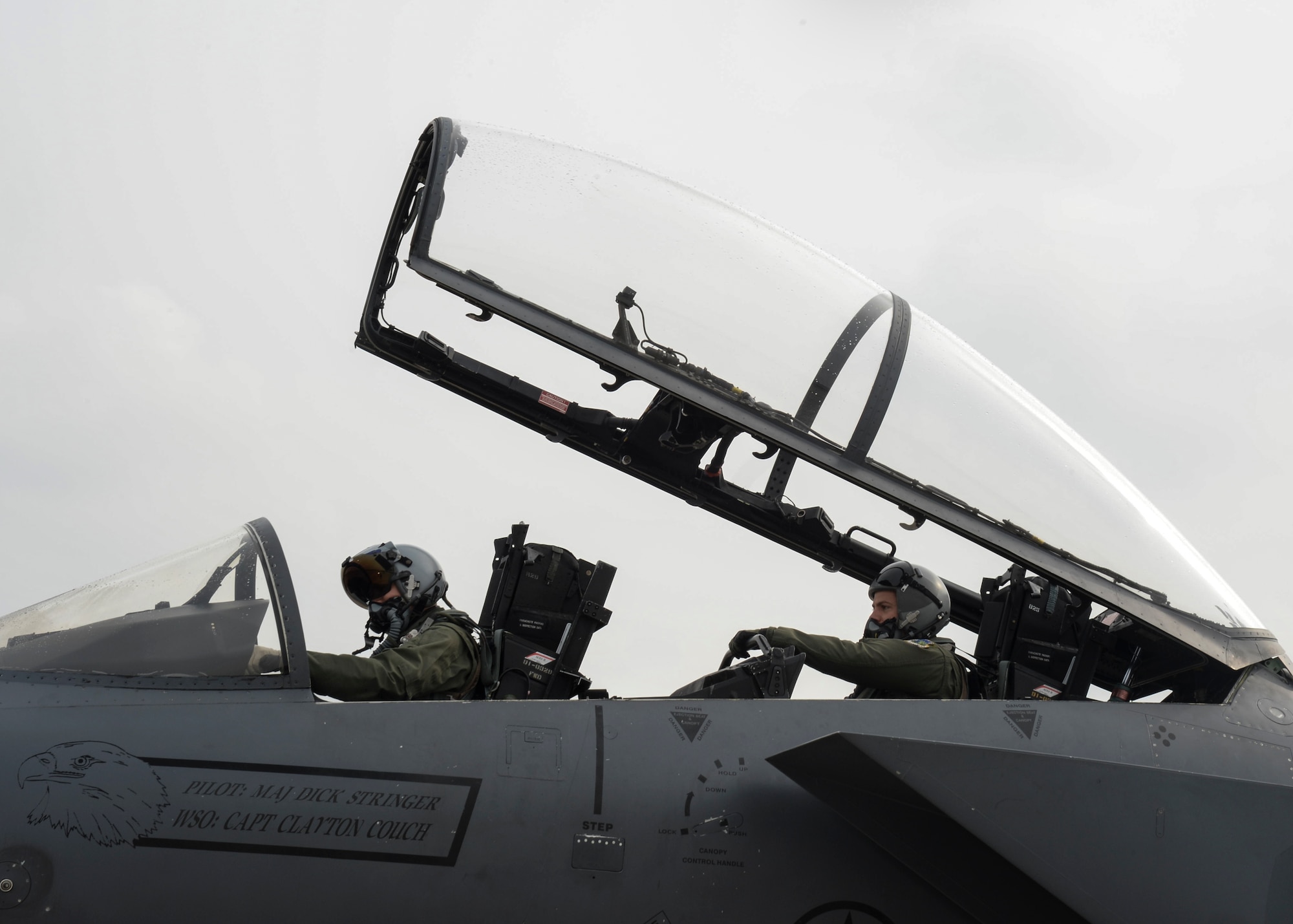 Capt. Derek Anderson, 494th Fighter Squadron pilot (left), and Maj. Reed Kastner, 494th Fighter Squadron weapons system officer, perform a preflight inspection on an F-15E Strike Eagle on the flightline at Royal Air Force Lakenheath, England, March, 28, 2014. The 494th FS is participating in Exercise Tonnerre Lightning, which is a series of training aimed at improving interoperability between the partner-nation air forces of the United Kingdom, France, and the United States. (U.S. Air Force photo by Airman 1st Class Nigel Sandridge) 
 
