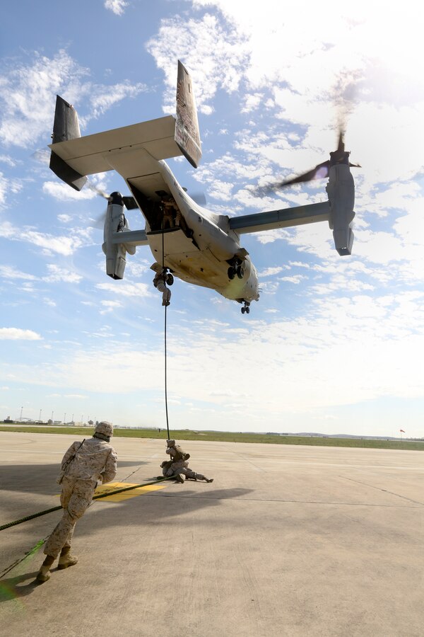 U.S. Marines of Special-Purpose Marine Air-Ground Task Force Crisis Response conduct helicopter rope suspension training aboard Moron Air Base, Spain, March 27, 2014. The training maintains and enhances SP-MAGTF Crisis Response's ability to rapidly respond to a broad range of crises throughout the U.S. Africa Command area of responsibility. (U.S. Marine Corps photo by Lance Cpl. Alexander Hill/Released)
