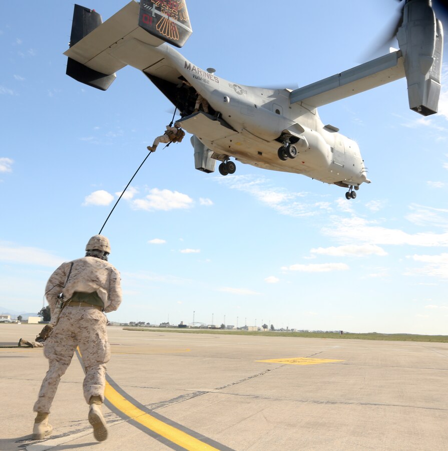 U.S. Marines of Special-Purpose Marine Air-Ground Task Force Crisis Response conduct helicopter rope suspension training aboard Moron Air Base, Spain, March 27, 2014. The training maintains and enhances SP-MAGTF Crisis Response's ability to rapidly respond to a broad range of crises throughout the U.S. Africa Command area of responsibility. (U.S. Marine Corps photo by Lance Cpl. Alexander Hill/Released)
