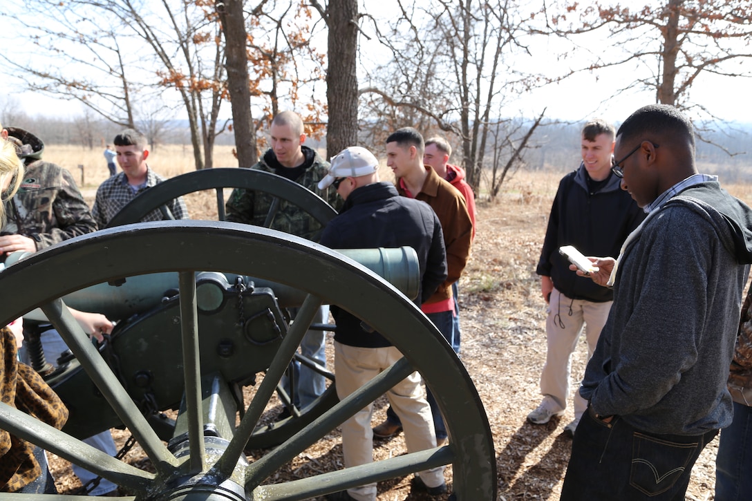 Marines photograph artillery canons used in the battle of Wilson's creek.