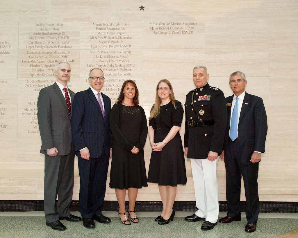 From the left, Brian Drumm; the President of Cornell University, David J. Skorton; Sally Gannon; President of Cornell Club of Washington, A'ndrea Van Schoick; the Assistant Commandant of the Marine Corps, Gen. John M. Paxton, Jr., and Ret. Lt. Gen. Robert Blackman, Jr.; pose for a photo after the Tribute to Major Richard J. Gannon II at the National Museum of the Marine Corps in Triangle, VA, March 30, 2014. (U.S. Marine Corps photo by Cpl. Tia Dufour/Released)