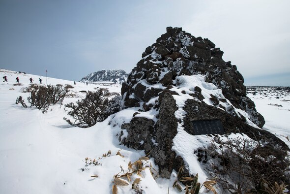 Travelers hike up Hallasan Mountain March 9, 2014, in Jeju Island, Republic of Korea. At 6,398 feet, Hallasan Mountain is the tallest mountain Korea. (U.S. Air Force photo by Staff Sgt. Jake Barreiro)