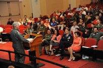 Retired Lt. Col. Richard Smith, Prisoner of War from October 1967 to March 1973, speaks to an audience during the 41st Freedom Flyer event March 28 at the Joint Base San Antonio-Randolph Fleenor Auditorium. In the years following the Vietnam War, the 560th Flying Training Squadron hosted the pilot requalification program for the members of the 4th Allied POW Wing who were to return to flying. Since the first flight, May 21, 1973, 195 former POWs have been flown. (U.S. Air Force photo by Melissa Peterson)