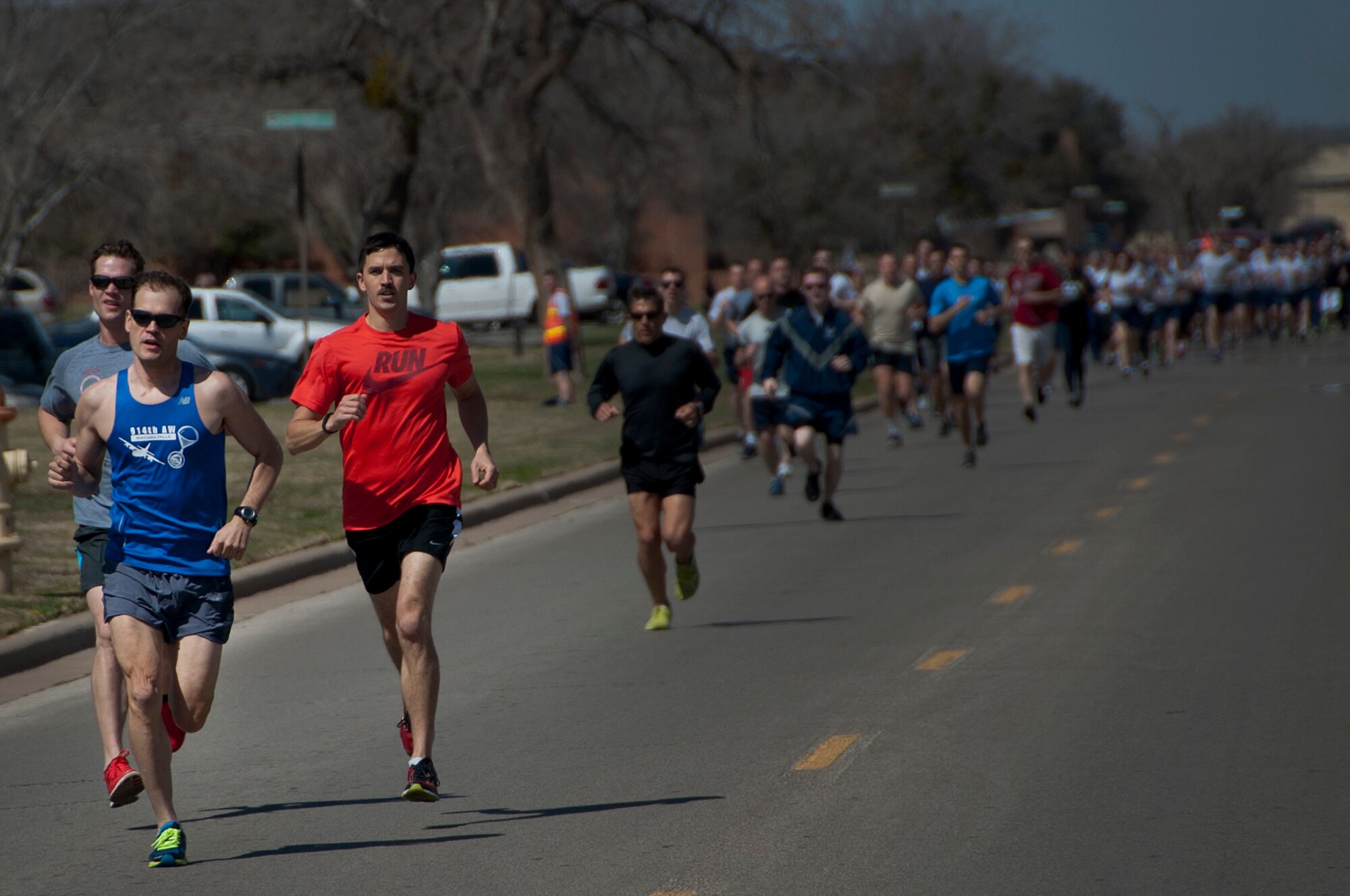 Senior Airman Joshua Williams, 361st Training Squadron student, led the pack from the beginning of the run until he crossed the finish line at Sheppard Air Force Base, Texas, during the Air Force Assistance Fund 5k run, March 24, 2014. The AFAF is one of only two official Air Force fundraisers that aims to provide support to Air Force personnel and their families. (U.S. Air Force photo/Airman 1st Class Robert L. McIlrath) 