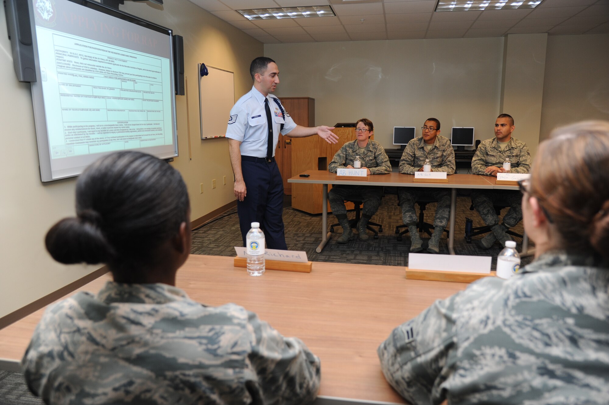 Tech. Sgt. Markuz Garcia, 336th Training Squadron, delivers a presentation during the second annual Top Tech competition March 27, 2014, at Allee Hall, Keesler Air Force Base, Miss.  Top Tech is an 81st Training Support Squadron competition that allows instructors to compete with their peers to hone skills and improve the overall instructor and military training leader corps. (U,S. Air Force photo by Kemberly Groue)