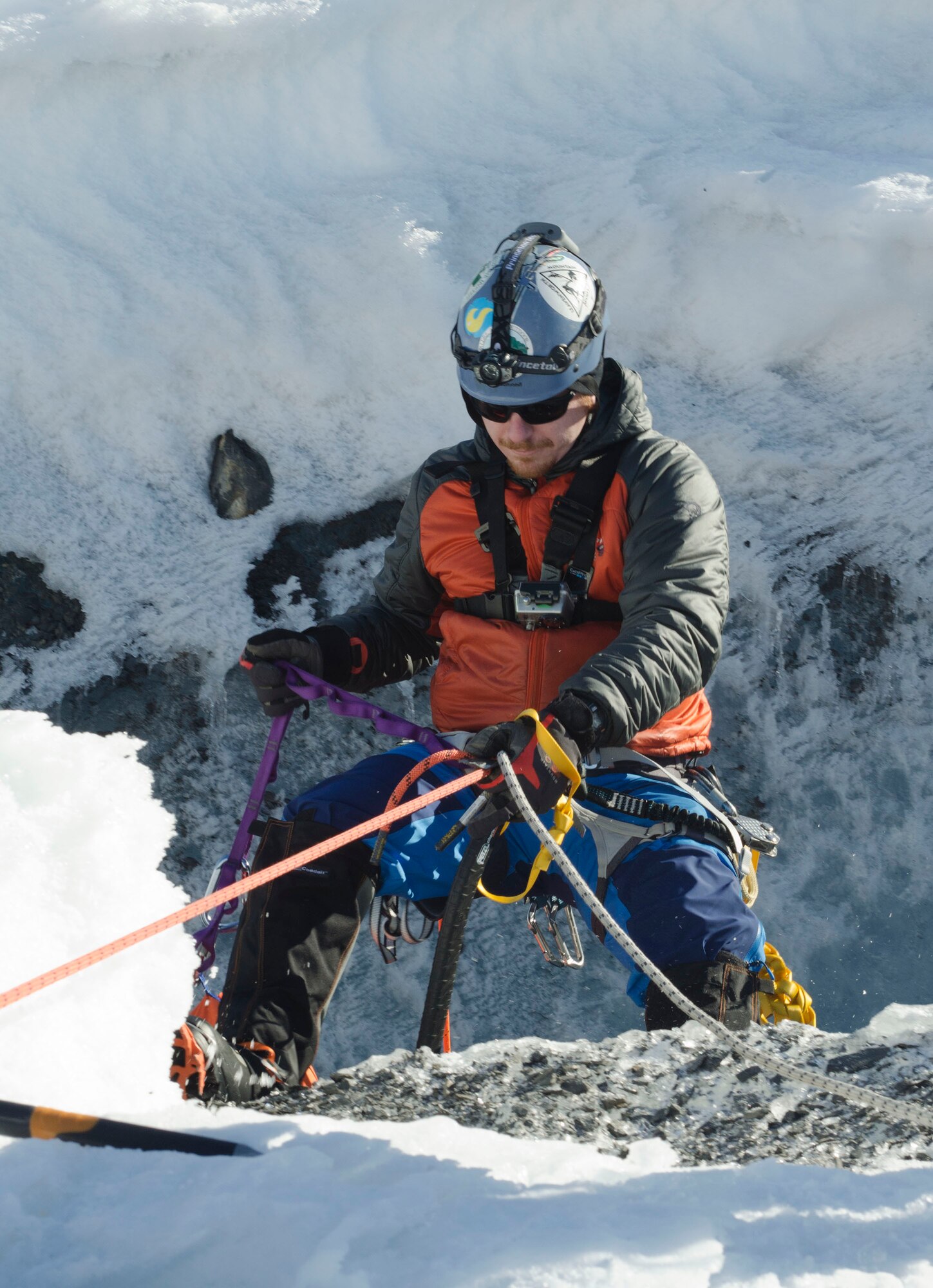 Chris Moulton, a firefighter with the Valdez Fire Department, rappels down a glacier while performing a glacier rescue during Alaska Shield 14, March 30, 2014. Alaska Shield 14 is an exercise that involves federal, state, local and military agencies, designed to test response and coordination efforts during a disaster and is modeled after the 1964 earthquake and subsequent tsunami that devastated much of South Central Alaska including the city of Valdez. (U.S. Army photo by Spc. True Thao)