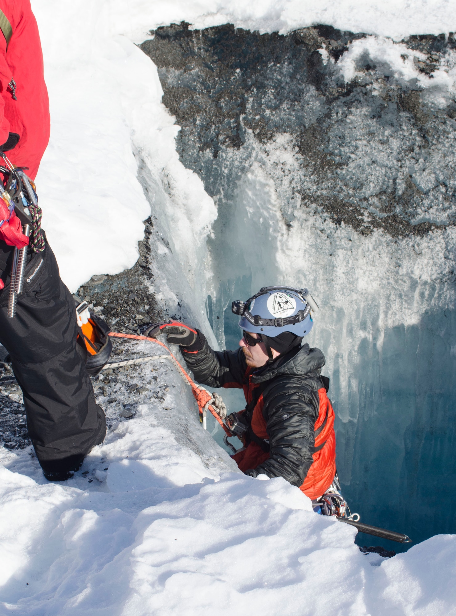 Chris Moulton, a firefighter with the Valdez Fire Department, climbs up a glacier after conducting a glacier rescue during Alaska Shield 14 here, March 30, 2014. Alaska Shield 14 is an exercise that involves federal, state, local and military agencies, designed to test response and coordination efforts during a disaster and is modeled after the 1964 earthquake and subsequent tsunami that devastated much of South Central Alaska including the city of Valdez. (U.S. Army photo by Spc. True Thao)