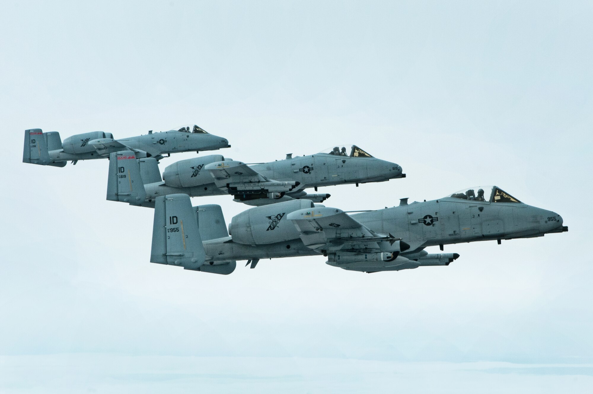 Capt. Casey Peasley, flying the lead aircraft, with 1st Lt. Micha Stoddard, followed by Maj. Jay Labrum, from the 190th Fighter Squadron, Boise, Idaho, fly the mighty A-10 Thunderbolt II "Warthog" in an echelon formation on March 26. The three aircraft fly next to a KC-135 Stratotanker, for refueling enroute from the air combat exercise Green Flag East, Barksdale Air Force Base, La. (Air National Guard photo by Master Sgt. Becky Vanshur)


