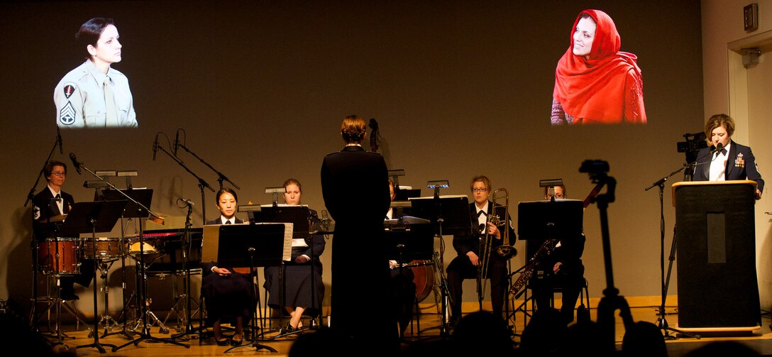 1st Lt. Shanti Simon Nolan leads members of the USAF Band in The Soldier's Tale by Igor Stravinsky at the Women in Military Service for America Memorial. Tsgt Emily Wellington and TSgt Julia Brundage performed as The Soldier and The Devil respectively(photo by MSgt Tracey MacDonald/released)