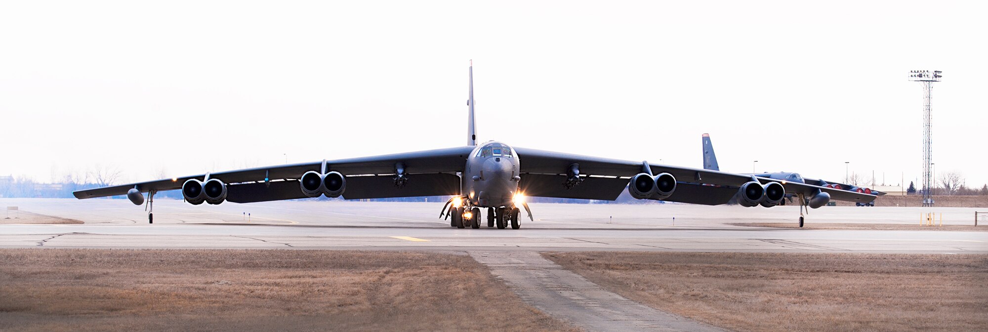 A B-52H Stratofortress taxis towards the runway to await take-off at Minot Air Force Base, N.D., March 27, 2014. A group of B-52s travelled to Ellsworth AFB in preparation for runway construction that is slated to begin in early April and scheduled to be completed by September.  (U.S. Air Force photo/Senior Airman Andrew Crawford)