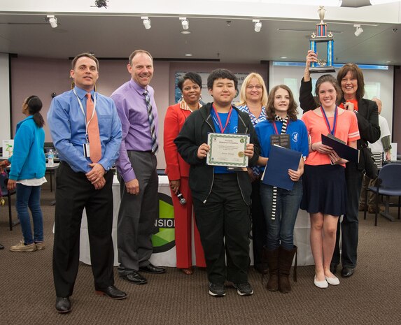 Middle school students compete in DimensionU games at SPAWAR Systems Center Atlantic, March 28, 2014, on Joint Base Charleston – Weapons Station. The Tri-County DimensionU competition pitted more than 90 students from eight local middle schools in a competition testing their math and science skills in online, multi-player educational video games. (U.S. Navy photo/Joe Bullinger)