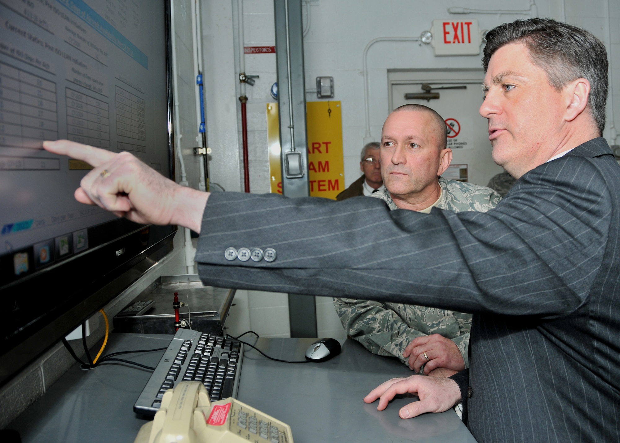 Pennsylvania Lt. Governor, Jim Cawley, reviews the isochronal maintenance inspection process with Chief Master Sgt. Terrance Keblish during a visit to Pittsburgh International Airport Air Reserve Station, March 26, 2014. Cawley also held a press conference here which included other elected officials showing their support for Pennsylvania’s military. The day included a mission brief at the 171st Air Refueling Wing, Pennsylvania Air National Guard, and 316th Sustainment Command, Army Reserve. (U.S. Air Force photo by Senior Airman Joshua J. Seybert) 