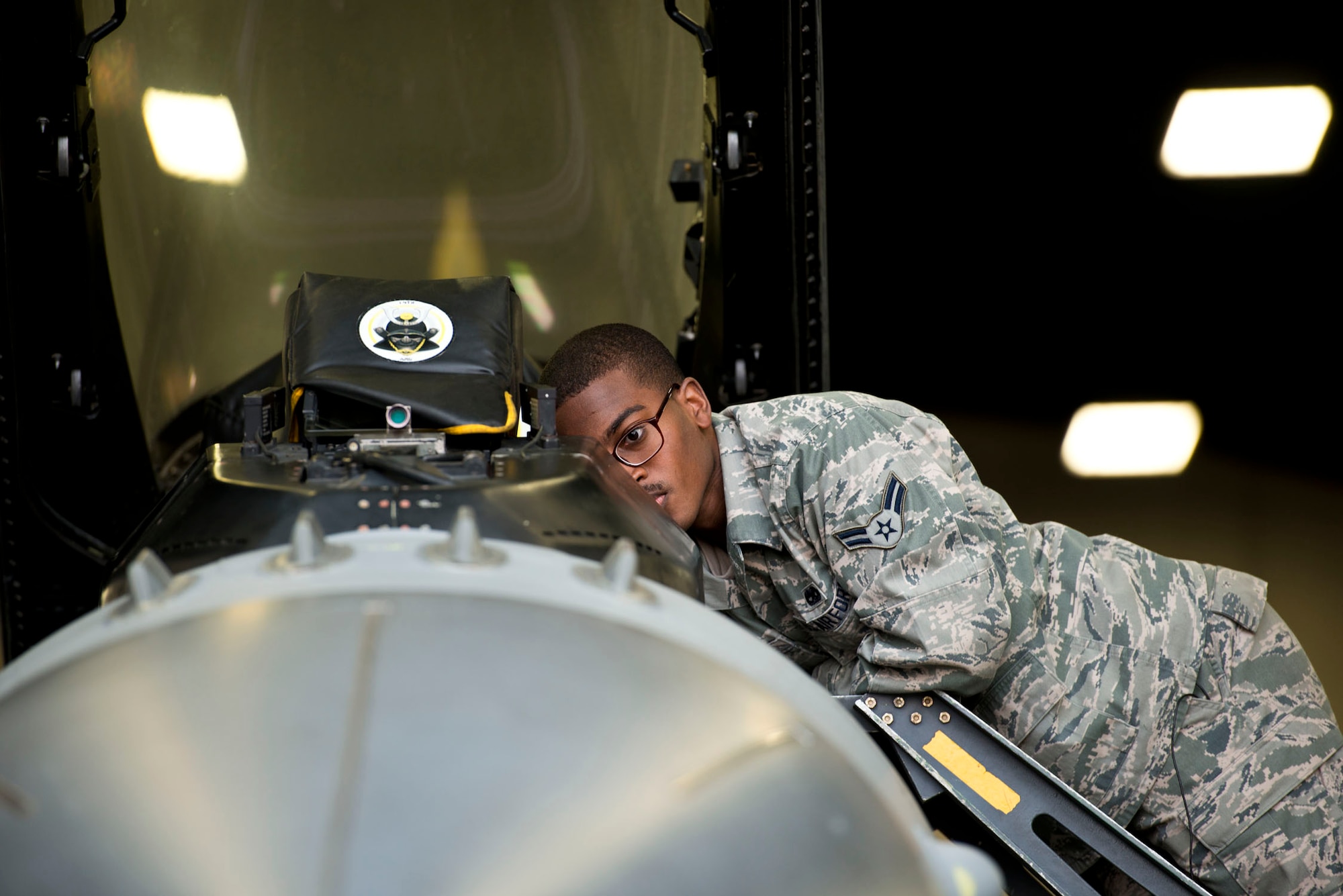 U.S. Air Force Airman 1st Class Paul Taylor, 35th Maintenance Squadron fuels systems repair journeyman, conducts function checks on an F-16 Fighting Falcon at Misawa Air Base, Japan, March 28, 2014.  Taylor hails from New Orleans, La., and will be PCSing to Osan Air Base, Republic of Korea, in December.  
(U.S.  Air Force photo/Tech. Sgt. Araceli Alarcon)