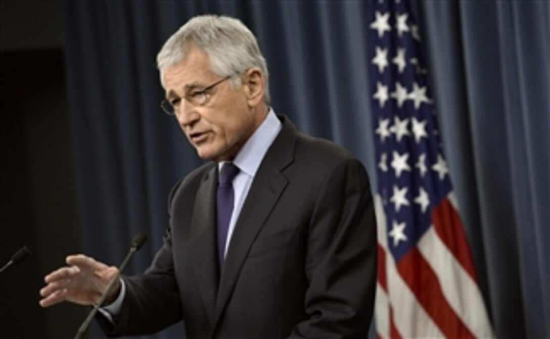 Defense Secretary Chuck Hagel answers questions from reporters during a press conference at the Pentagon, March 31, 2014. Hagel discussed ongoing efforts to recover American service member remains from past conflicts and took questions about provocative actions by North Korea and the situation in the Ukraine.