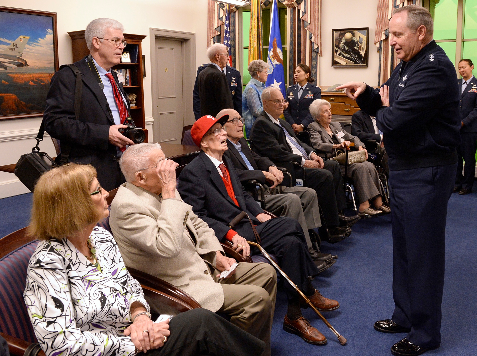 Air Force Chief of Staff Gen. Mark A. Welsh III (right) hosted an office call for Army Air Corps veterans and family members before presenting them with the Prisoner of War Medal during a ceremony April 30, 2014, in the Pentagon, Washington, D.C. The nine aviators served in World War II as bomber crew members and were shot down flying missions over Germany and were held in a prison camp in Wauwilermoos, Switzerland. U.S. Army Maj. Dwight Mears, whose grandfather Lt. George Mears, who was also held at the prison, fought diligently for 15 years to get the men recognized as POWs. (U.S. Air Force photo/Andy Morataya)