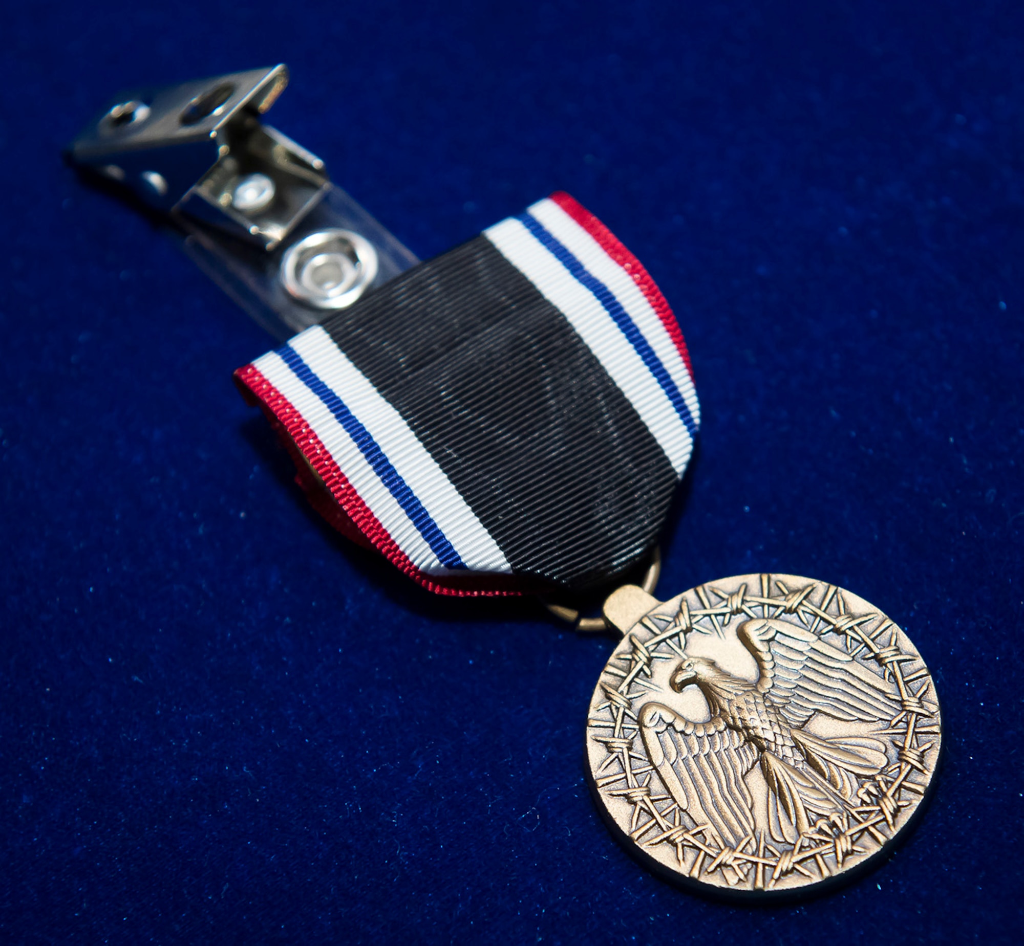 Air Force Chief of Staff Gen. Mark A. Welsh III presented the Prisoner of War Medal to Army Air Corps veterans and family members who served in World War II during a ceremony April 30, 2014, at the Pentagon. The honorees were bomber crew members, who were shot down while flying missions over Germany and were held in a prison camp in Wauwilermoos, Switzerland. Originally denied POW status, then Acting Secretary of the Air Force Eric Fanning authorized the medal for 143 Army Air Corps aviators in October 2013. (U.S. Air Force photo/Jim Varhegyi)