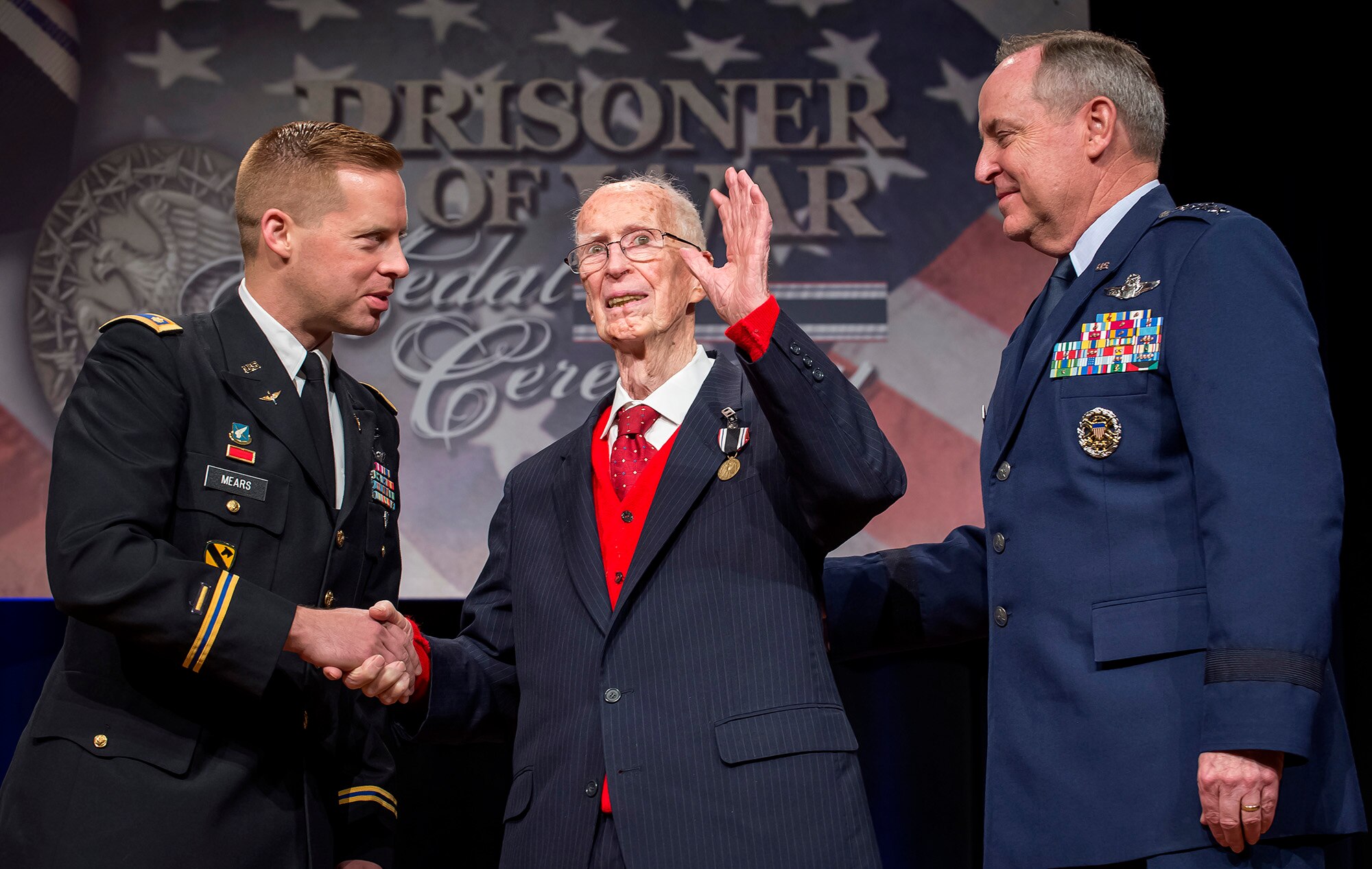 Air Force Chief of Staff Gen. Mark A. Welsh III (right) presented the Prisoner of War medal to 1st Lt. James Mahon April 30, 2014, during a ceremony in the Pentagon. Mahon and eight other aviators, all bomber crew members, were shot down flying missions over Germany and were held in a prison camp in Wauwilermoos, Switzerland. Then Acting Secretary of the Air Force Eric Fanning authorized the medal for 143 Army Air Corps aviators in October 2013, after the Airmen were denied the proper status for decades. (U.S. Air Force photo/Jim Varhegyi)