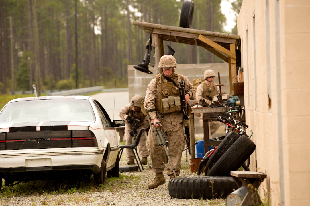 Pfc. Ryan Haselton, a combat engineer with Bravo Company, 2nd Combat Engineer Battalion, searches for improvised explosive devices with a metal detector during a counter IED course held at the Marine Corps Engineer School’s Home Station Training Lanes in Holly Ridge, N.C., April 25. The training area has 4.5 kilometers of roads with overpasses, round-abouts, intersections and two villages.
