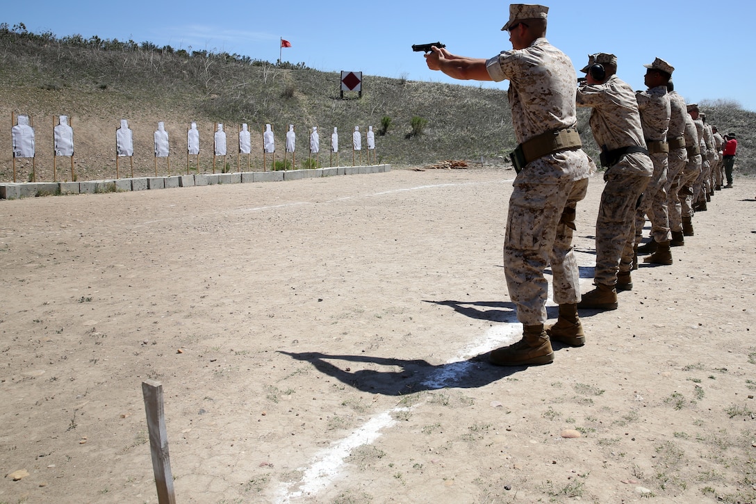 Marines from various units throughout the air station execute search and assess drills in Security Augmentation Force training aboard Marine Corps Air Station Miramar, Calif., May 1. The course was 10 days long and covered training from access control to use of force.