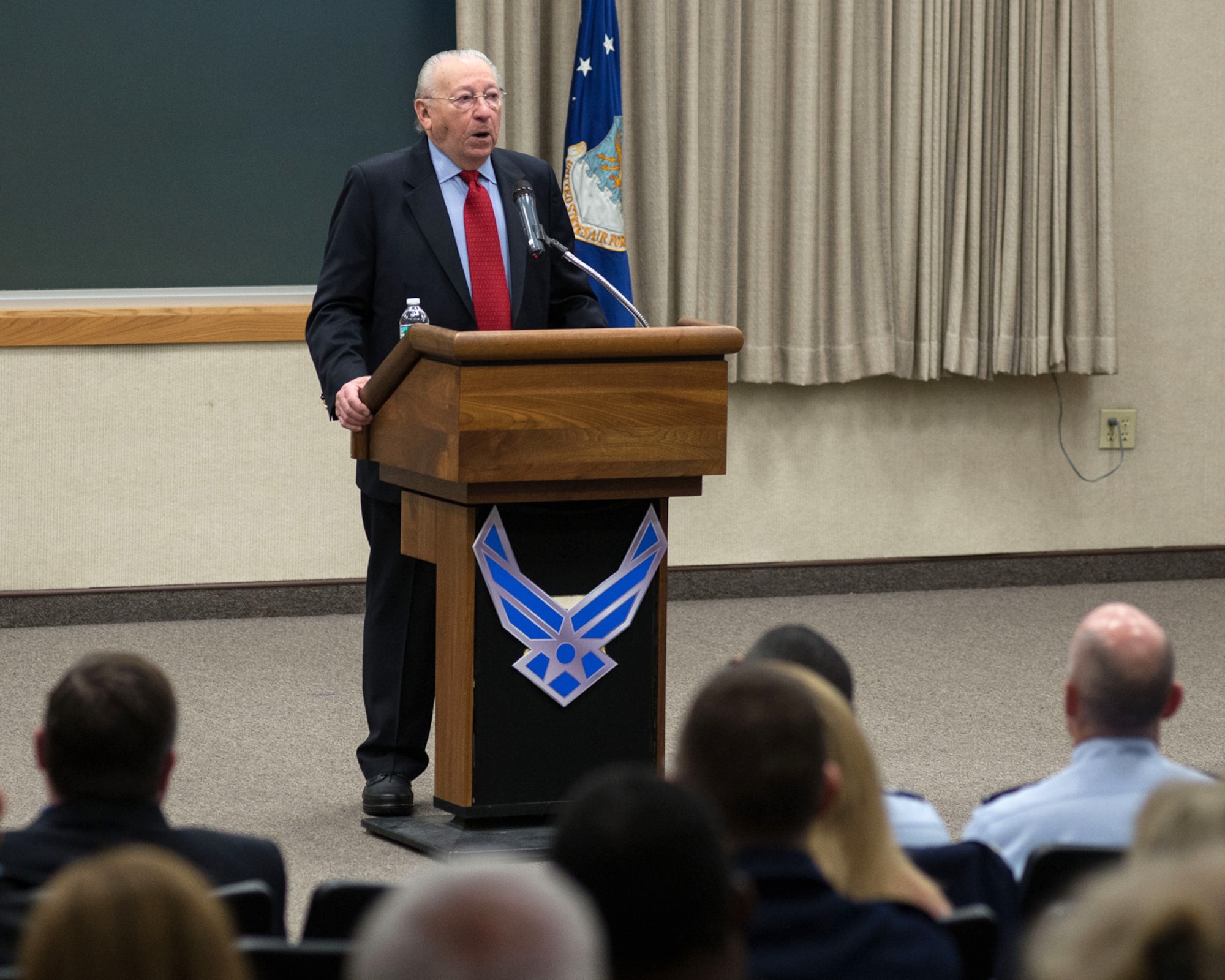 HANSCOM AIR FORCE BASE, Mass. -- Holocaust survivor Israel "Izzy" Arbeiter speaks to members of the Hanscom community during a Holocaust Days of Remembrance event at the Hanscom Conference Center April 28. Arbeiter spoke about his survival during the years that he was imprisoned and how he met his wife who was actually partly responsible for his survival while in a Starachowitze concentration camp. (U.S. Air Force photo by Mark Herlihy)
