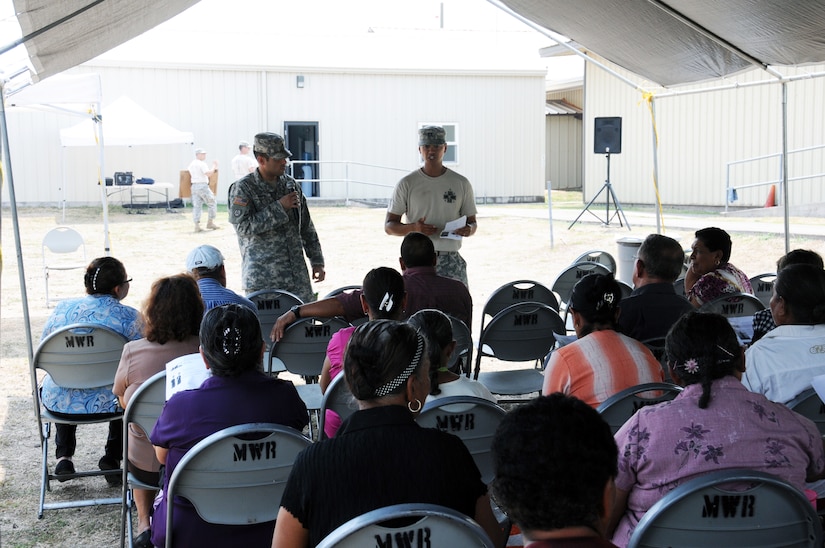 U. S. Army Capt. Allen Tangaan (right) with the assistance of his translator U. S. Army Staff Sgt. Ismael Arroyo, teaches a group of Honduran senior citizens the importance of exercising.  Joint Task Force-Bravo's Medical Element (MEDEL), with support from all Joint Task Force-Bravo commands, hosted the Soto Cano Air Base Senior Health Engagement providing valuable health and wellness information, a base tour, and some entertainment to 133 Honduran senior citizens from Cane, La Paz, April 30.  The group received health screenings and patient education related to blood pressure, blood sugar, exercise, muscle strength, balance and good oral hygiene as they age.  After the screenings and classes were finished, the group of senior citizens was able to turn back the hands of time and act young again as they were treated to dance lessons and the opportunity to dance with members from Joint Task Force-Bravo.  (Photo by U. S. Air National Guard Capt. Steven Stubbs)
